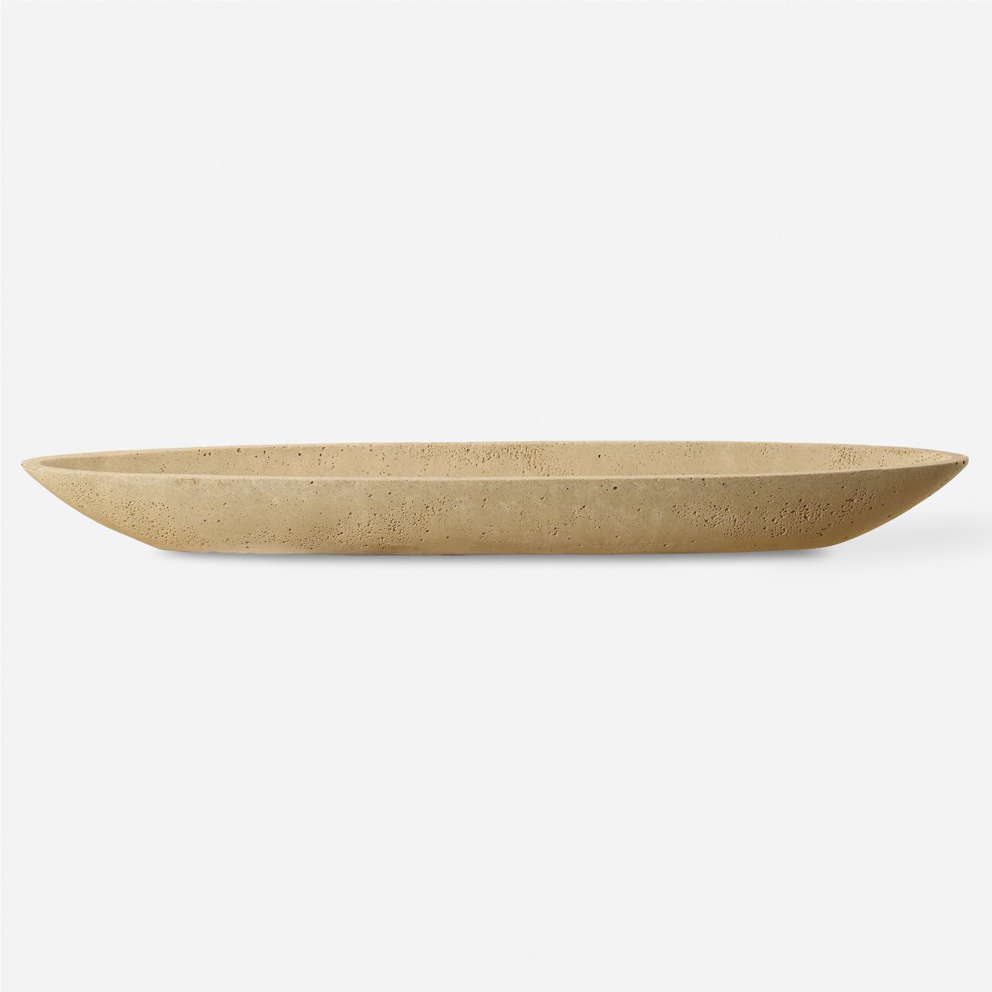 Shown in Embrace The Perfect Fusion Of Aesthetics And Utility With This Canoe-Shaped Bowl, Crafted From A Uni finish