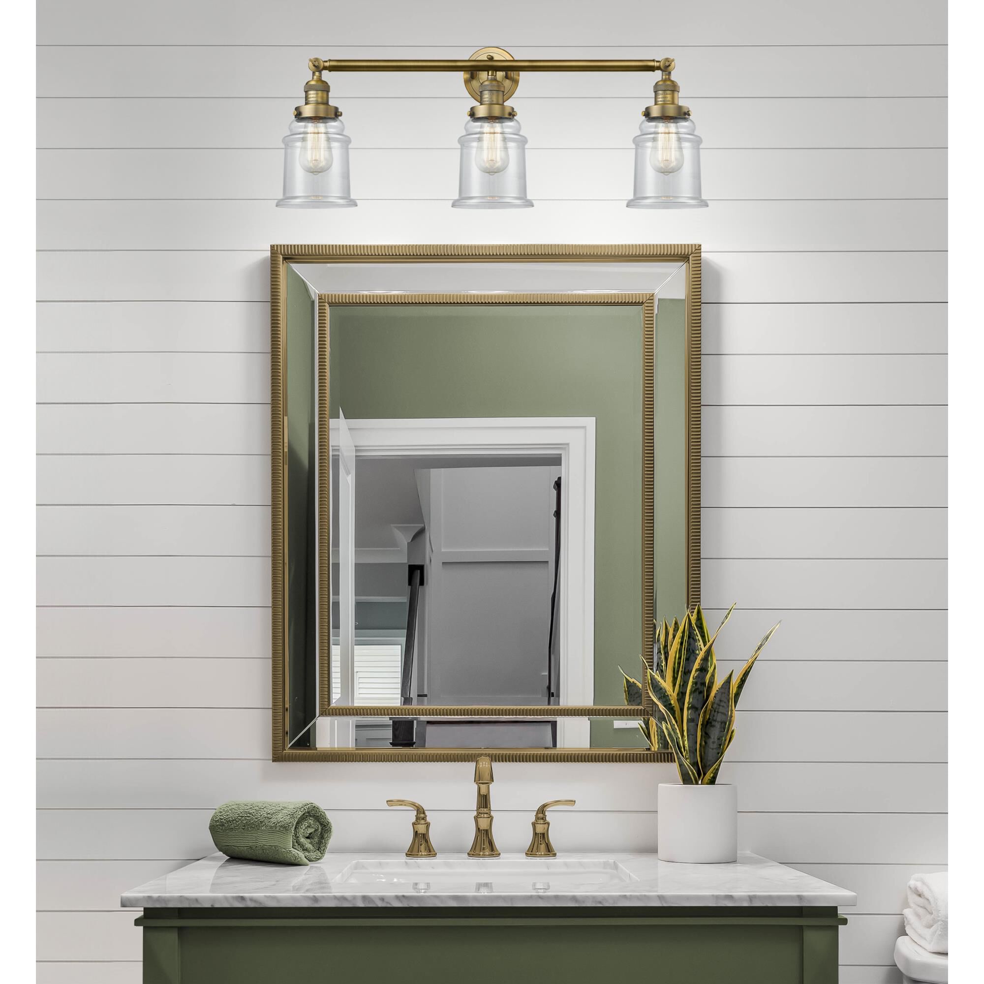 Shown in Brushed Brass finish and Clear glass