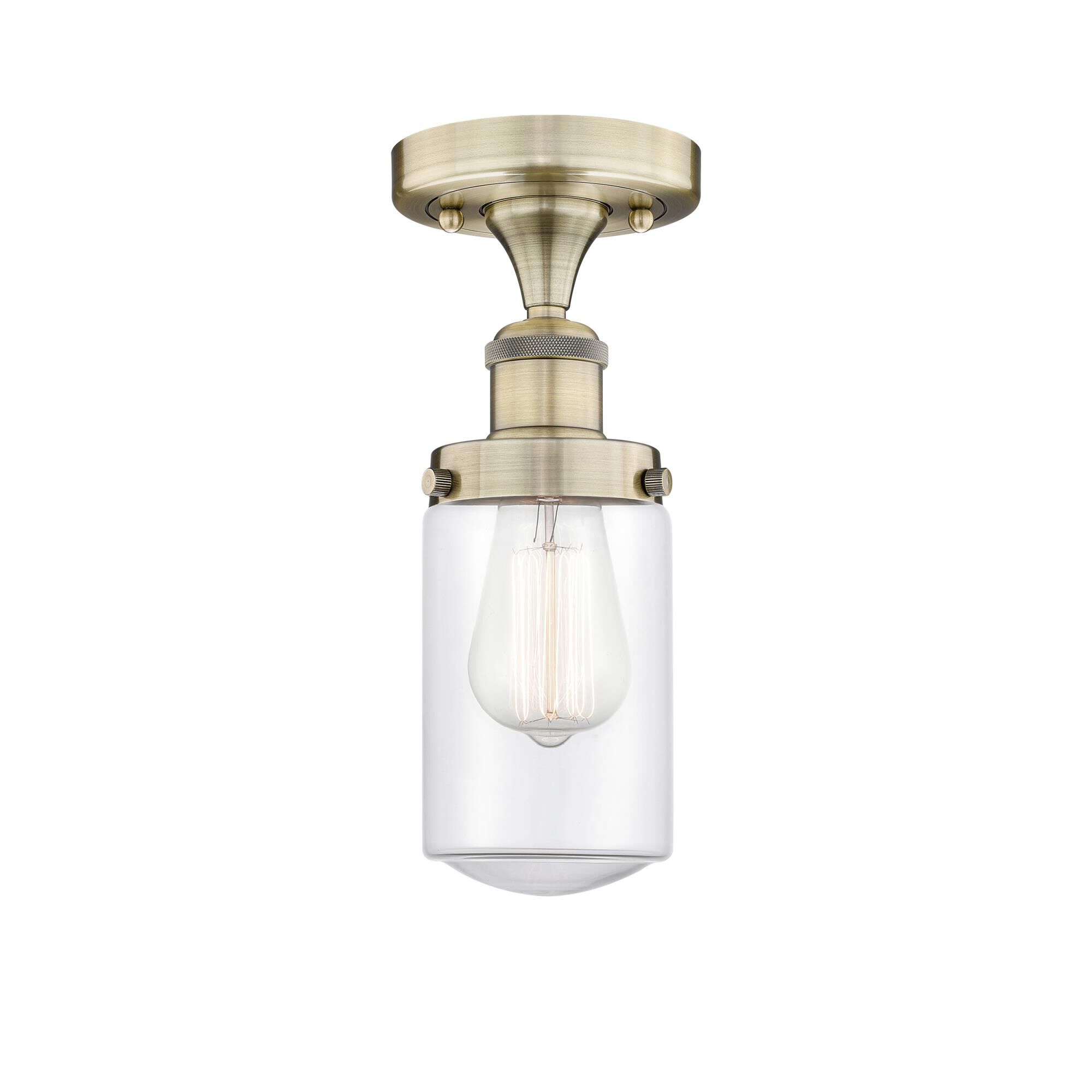 Shown in Antique Brass finish and Clear glass