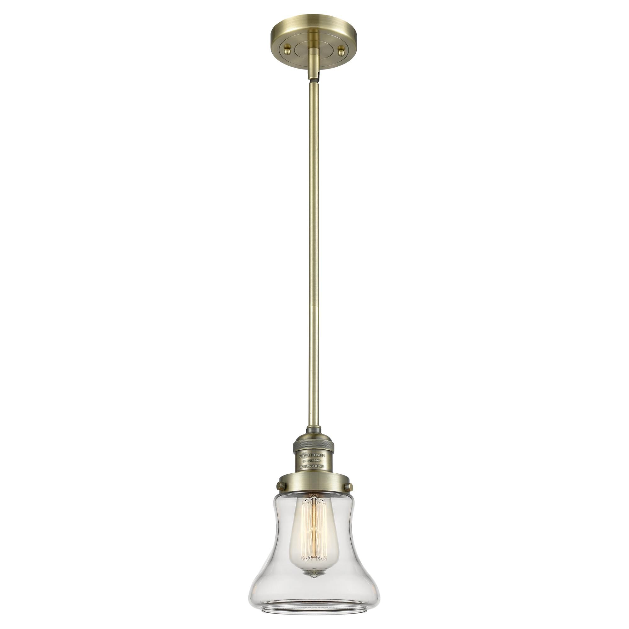 Shown in Antique Brass finish and Clear glass