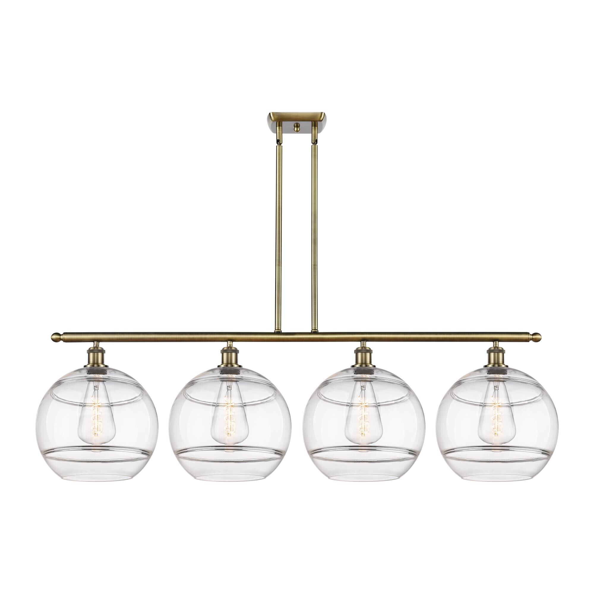 Shown in Antique Brass finish and Clear glass