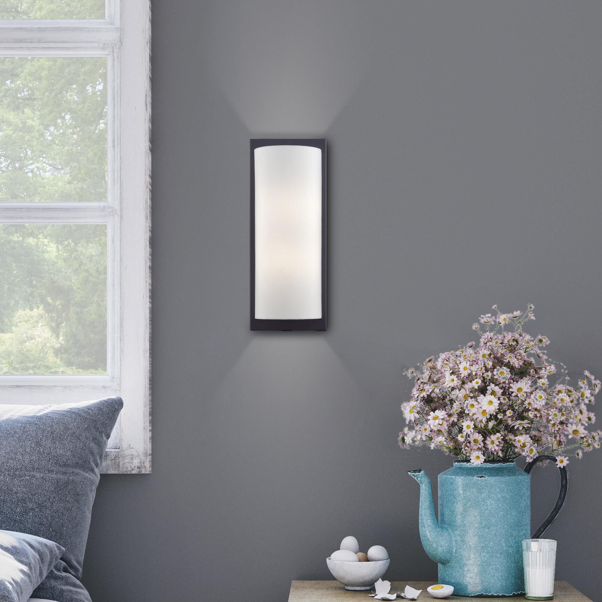 Shown in Black finish and Hand Crafted Off-White Fabric Hardback shade