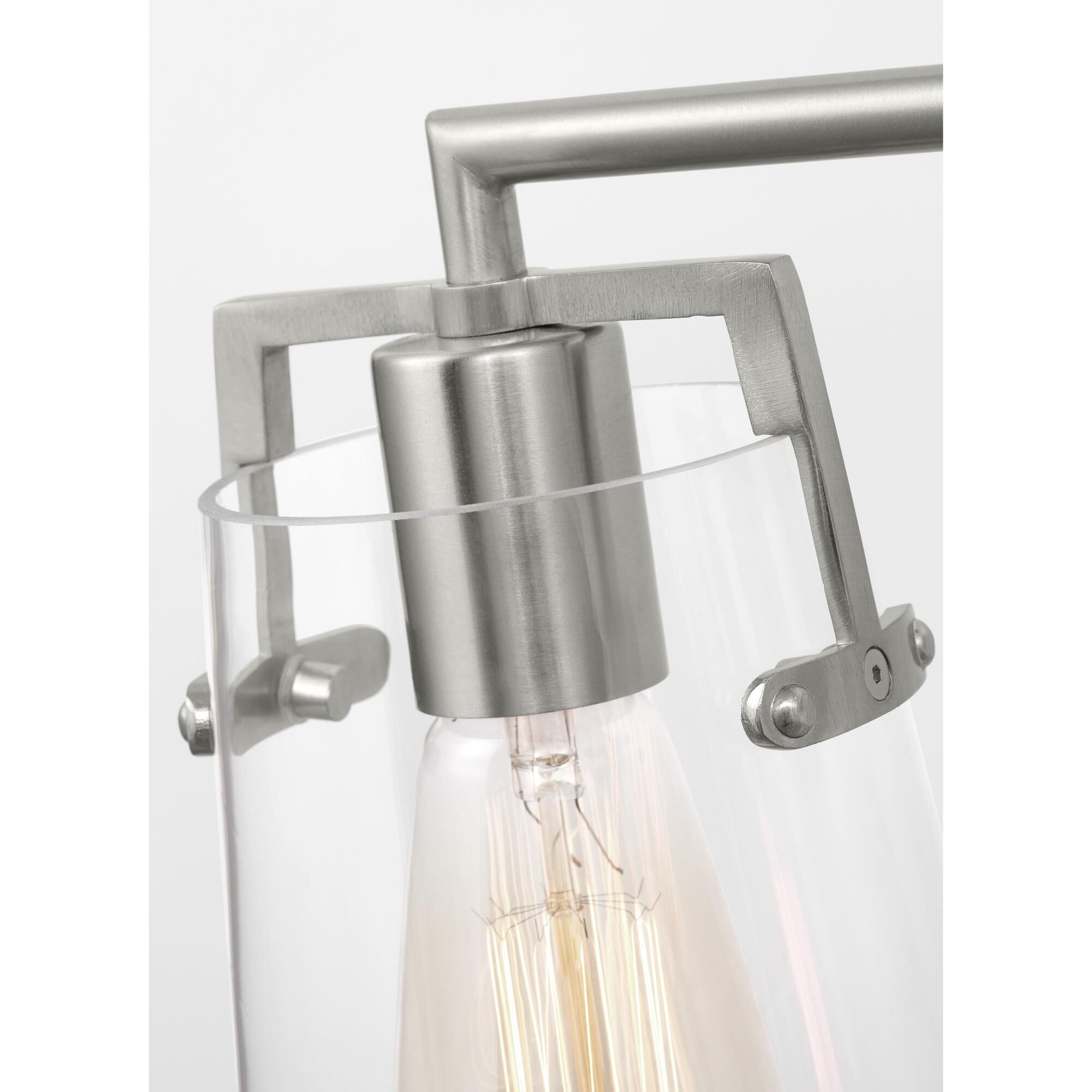 Shown in Brushed Steel finish and Clear Glass s shade