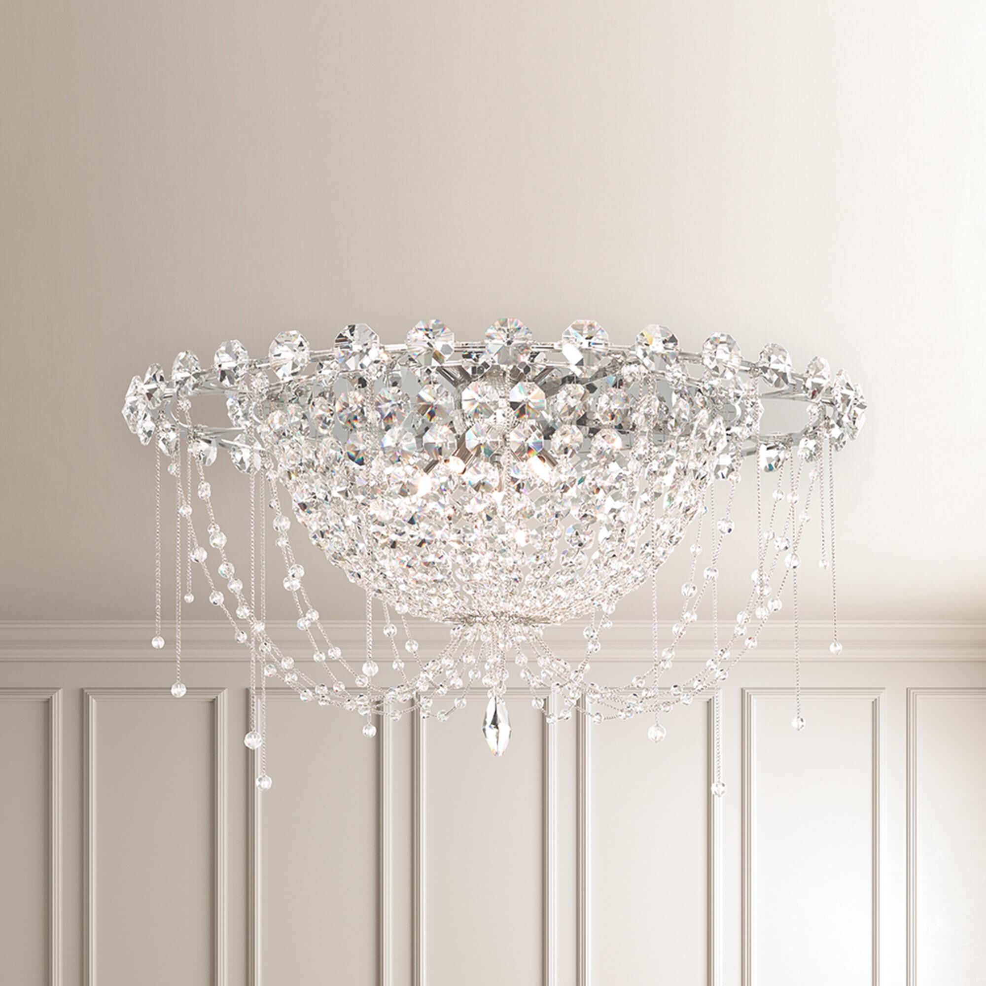 Shown in Polished Stainless Steel finish and Clear Radiance crystal