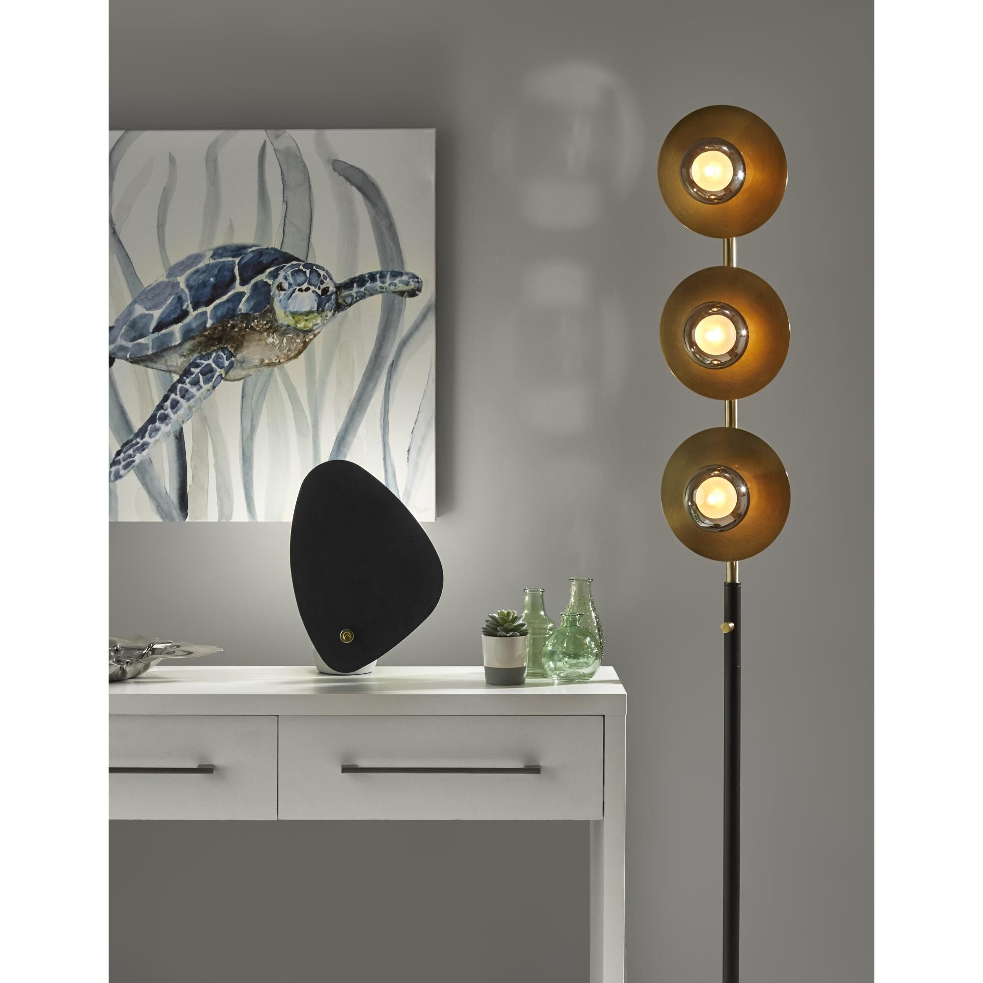 Shown in Black with Antique Brass Accent finish and Black Metal shade