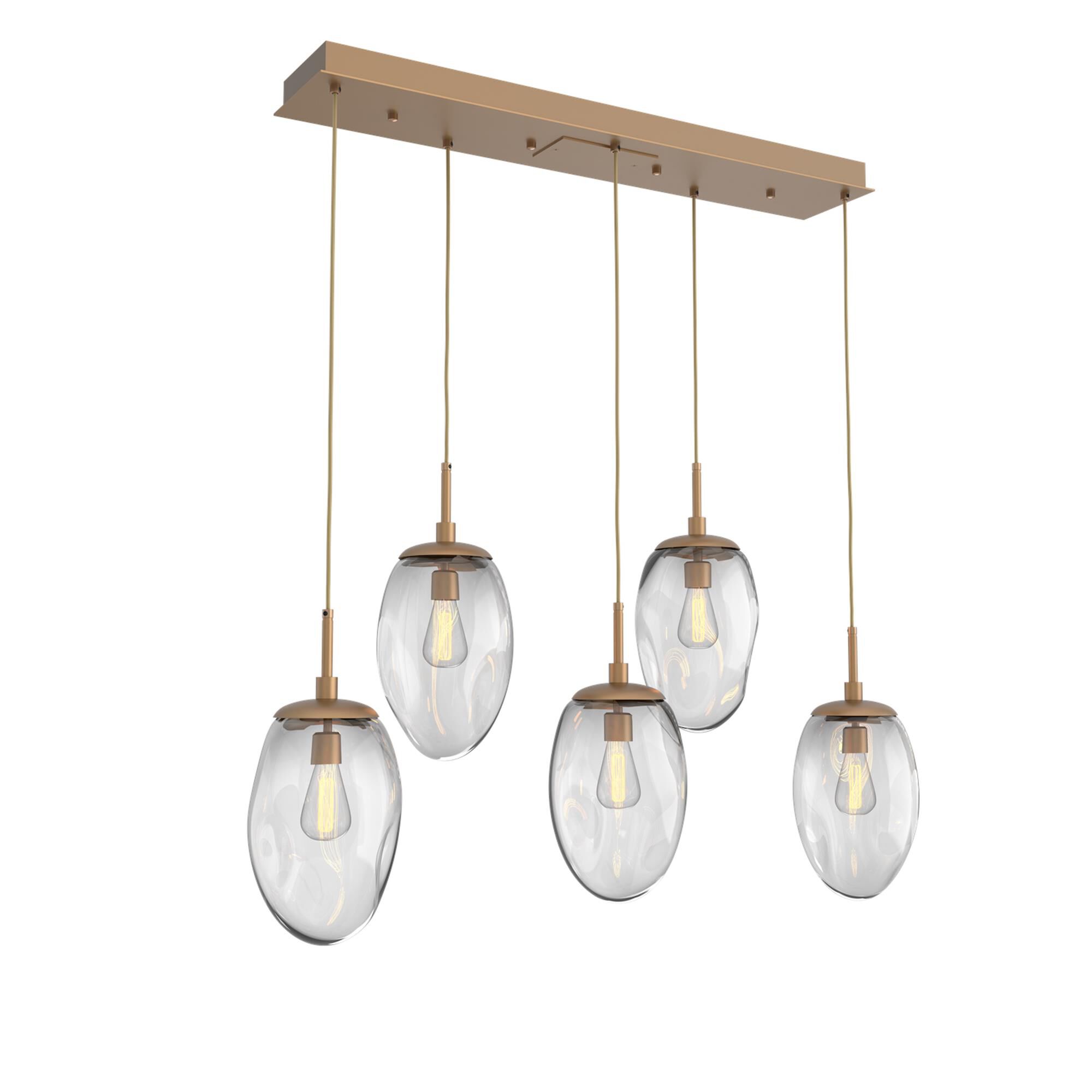 Shown in Novel Brass finish and Clear Blown glass