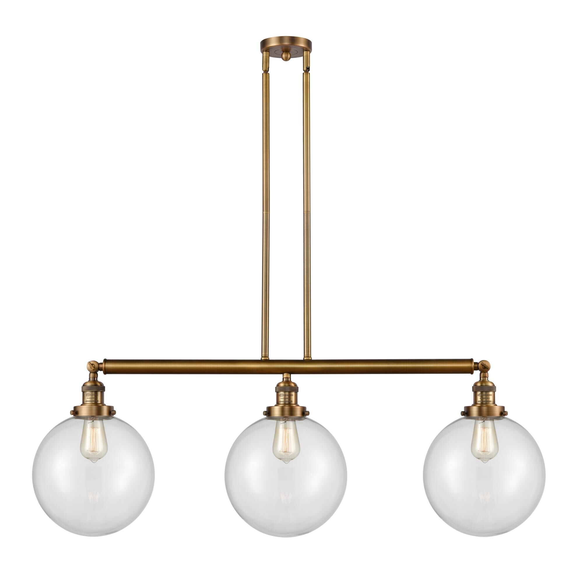 Shown in Brushed Brass finish and Clear Beacon glass