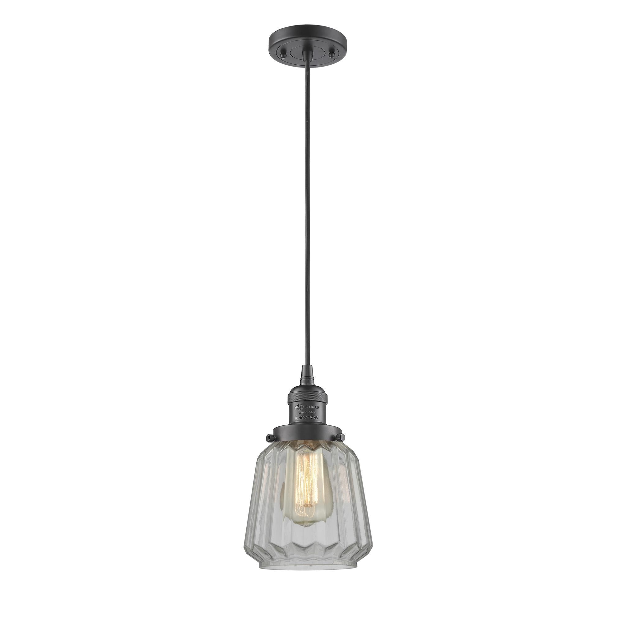Shown in Oil Rubbed Bronze finish and Clear Fluted glass