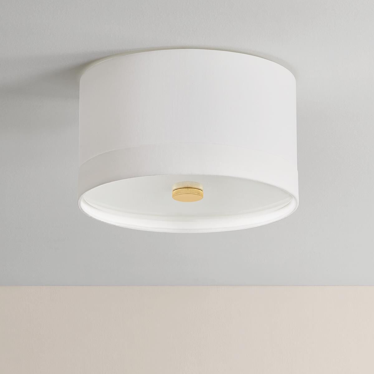 Shown in Aged Brass finish and White Linen shade