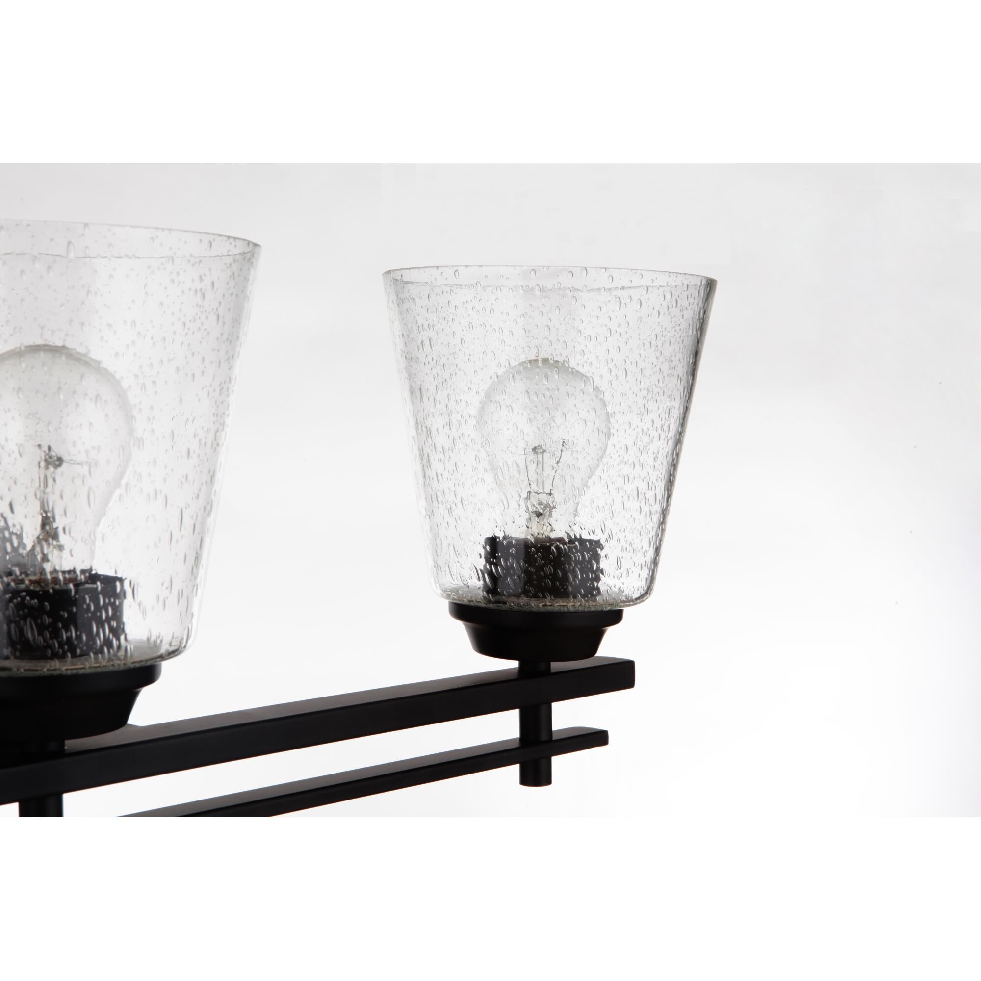 Shown in Flat Black finish and Clear Seeded glass and Glass shade