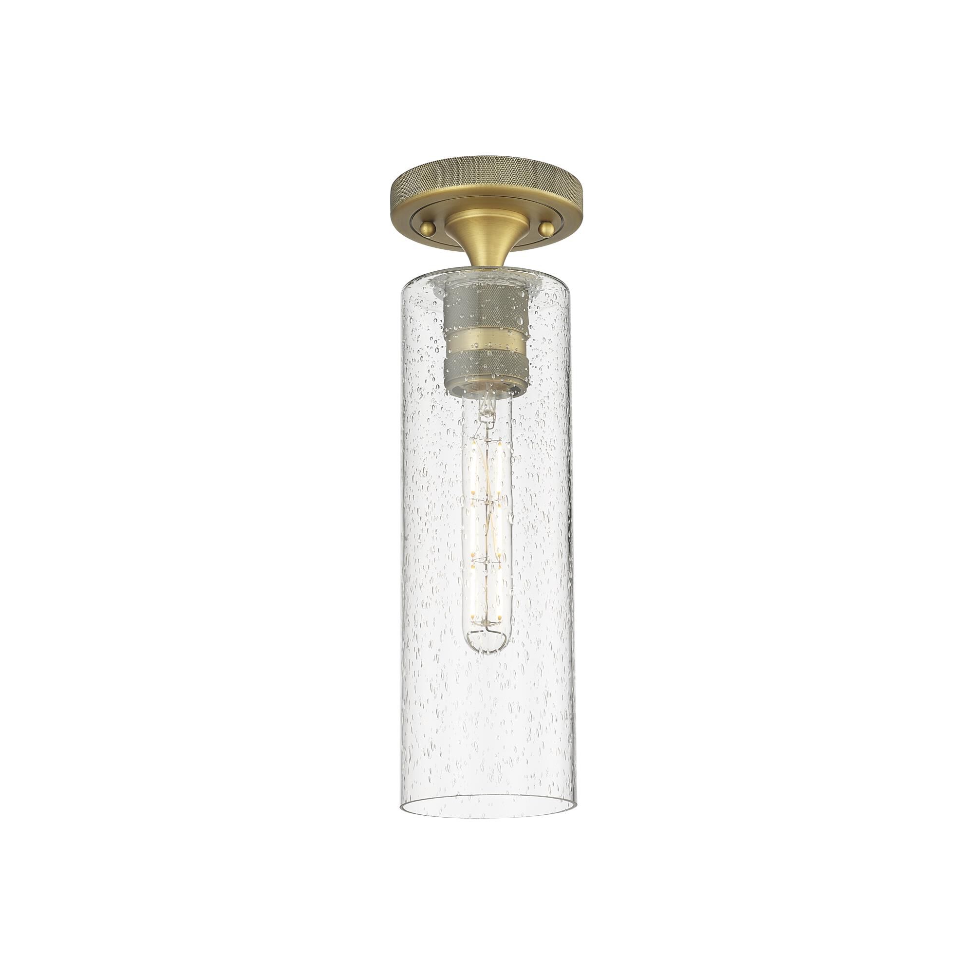 Shown in Brushed Brass finish and Seedy glass and Seedy Glass shade