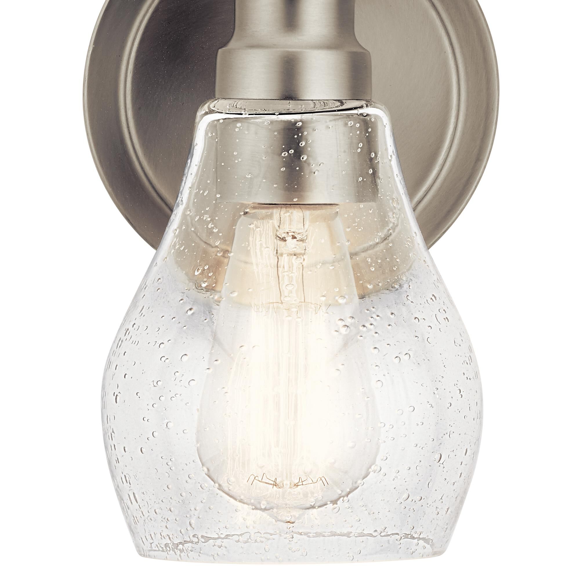 Shown in Brushed Nickel finish and Clear Seeded glass