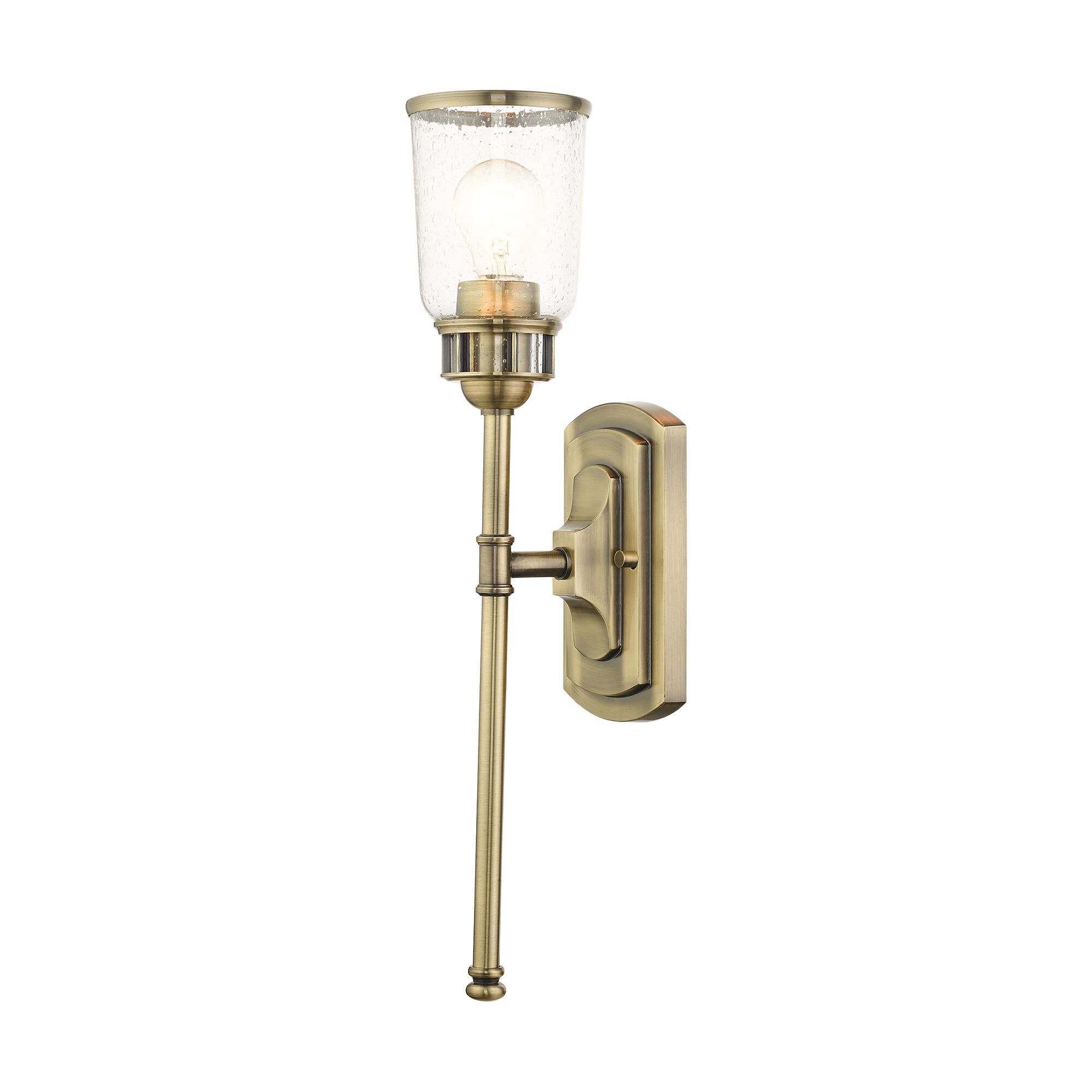 Shown in Antique Brass finish and Hand Blown Clear Seeded glass and Hand Blown Clear Seeded Glass shade