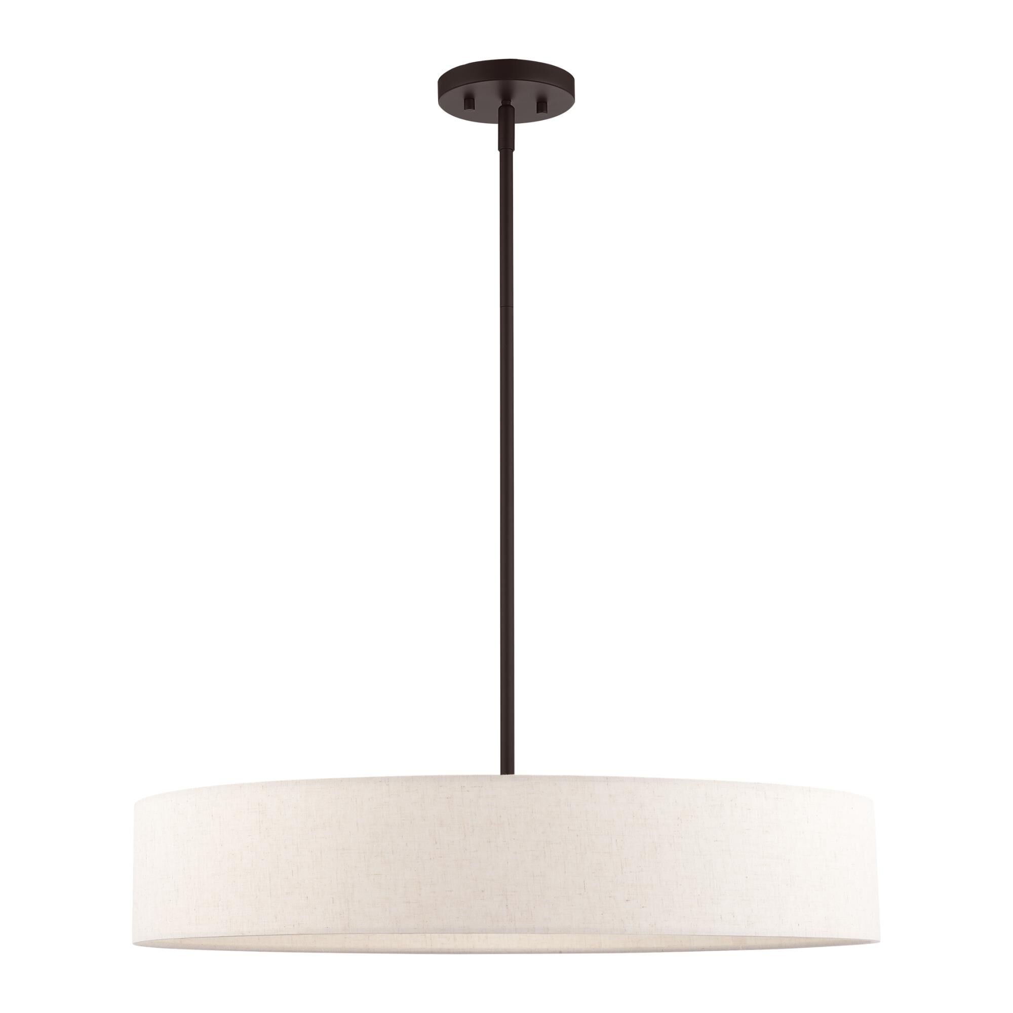 Shown in Bronze With Antique Brass Accents finish and Hand Crafted Oatmeal Fabric Hardback Shade glass and Hand Crafted Oatmeal Fabric Hardback shade