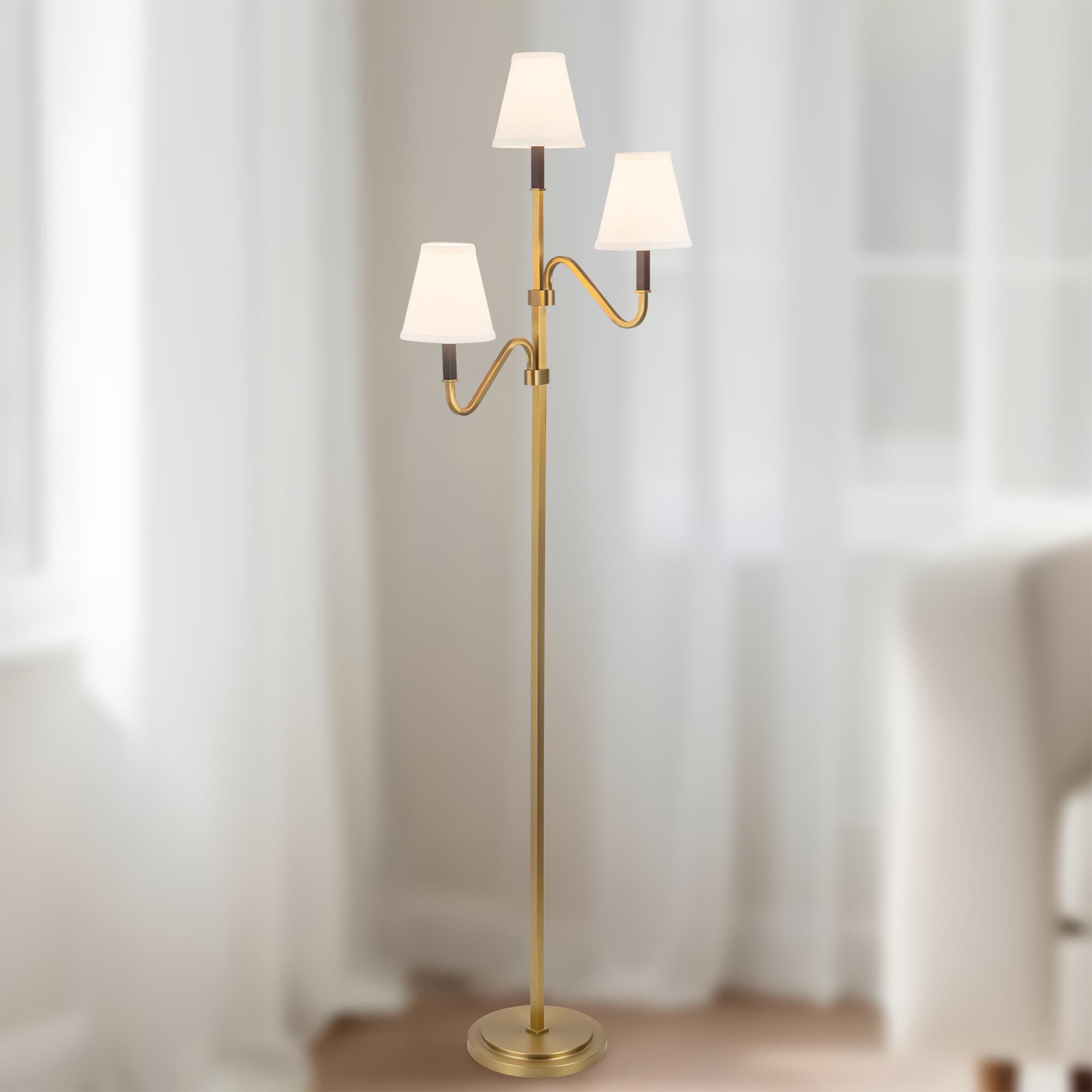 Shown in Brushed Gold finish and White Linen shade
