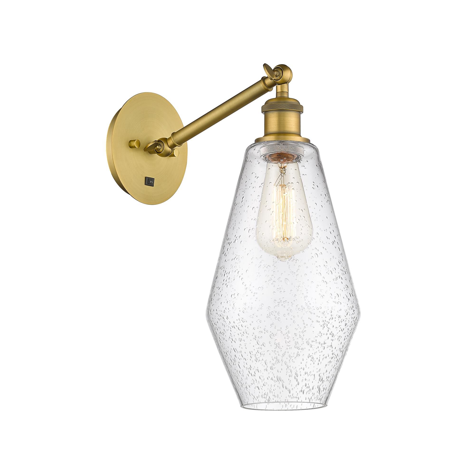 Shown in Brushed Brass finish and Seedy glass