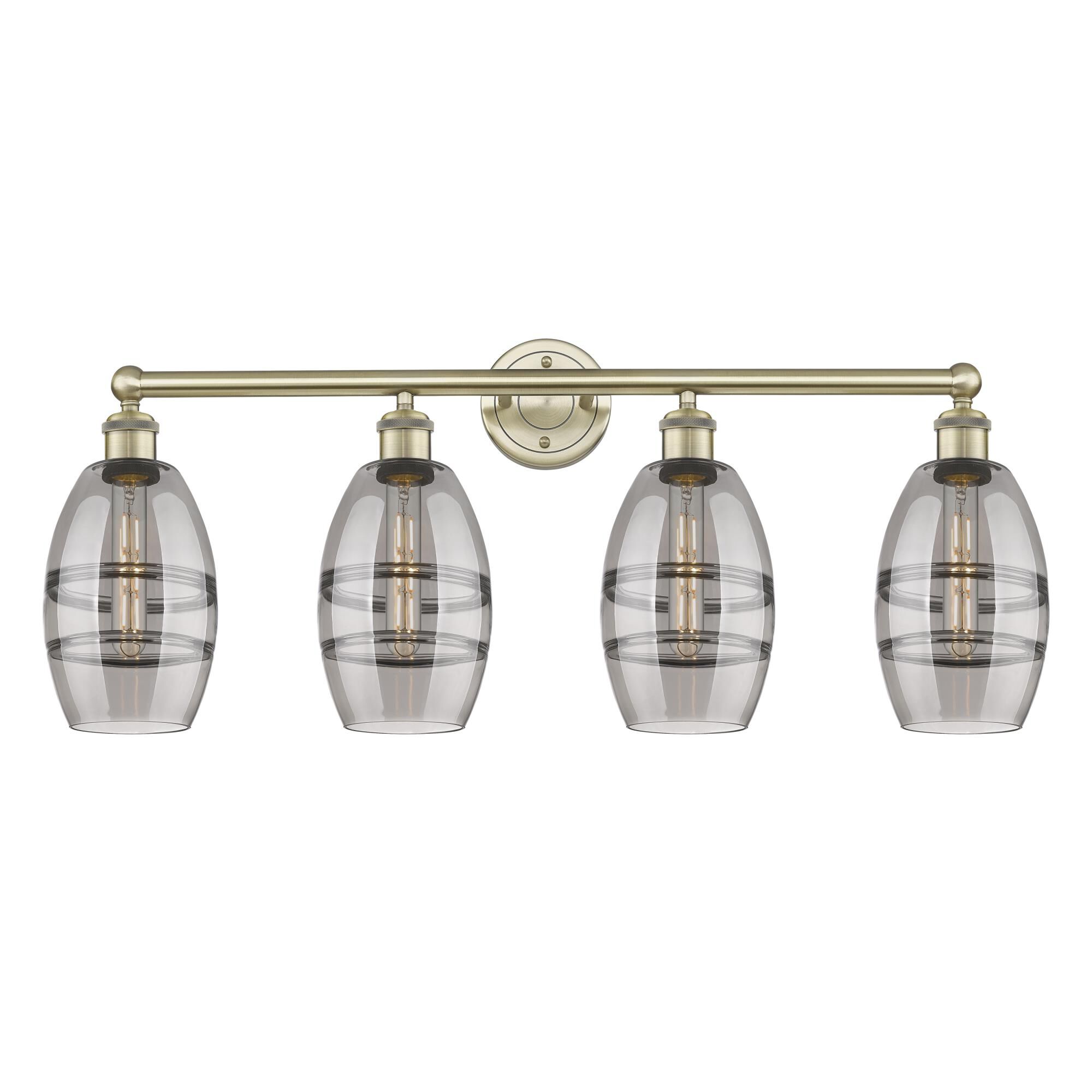 Shown in Antique Brass finish and Light Smoke glass