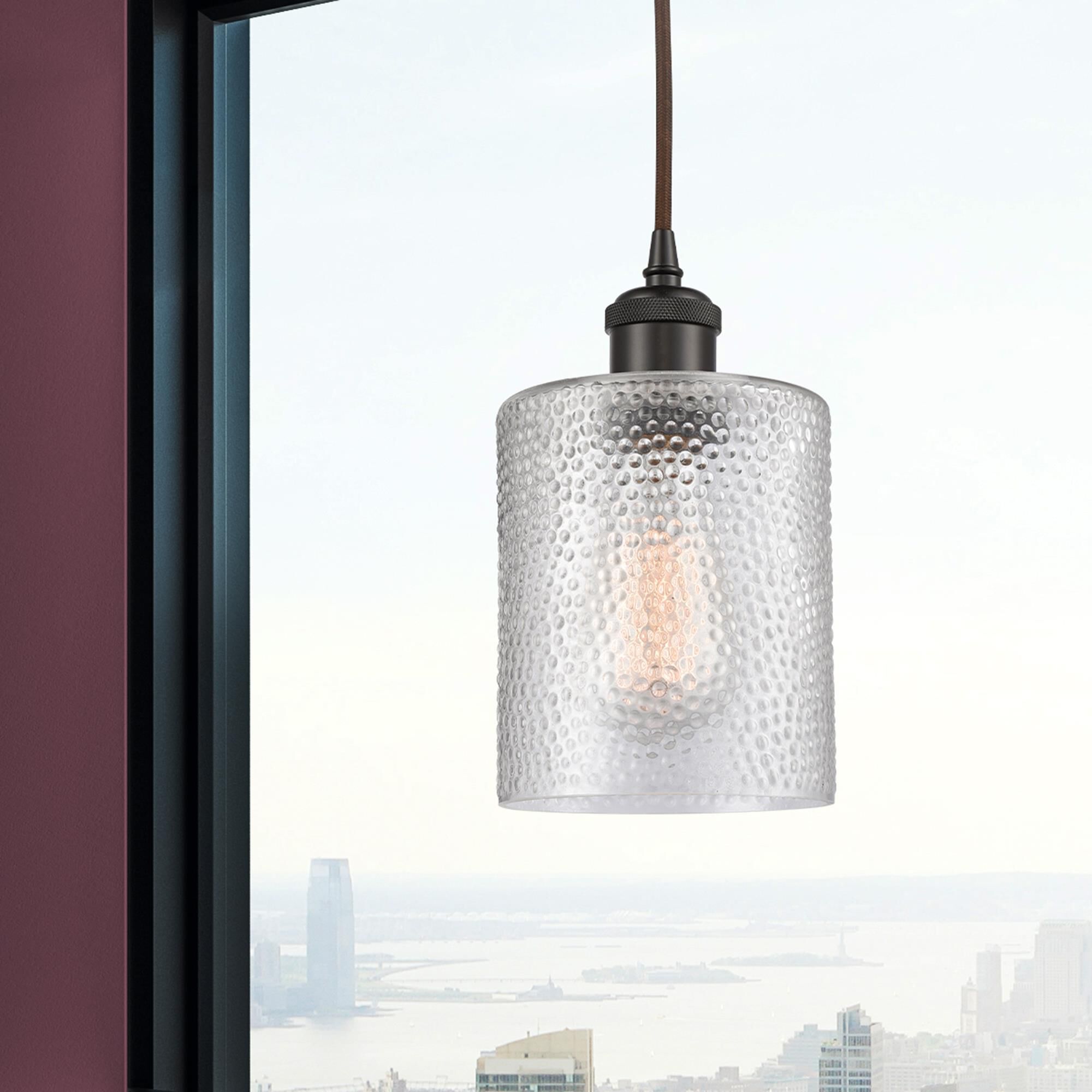 Shown in Oil Rubbed Bronze finish and Clear Ripple glass