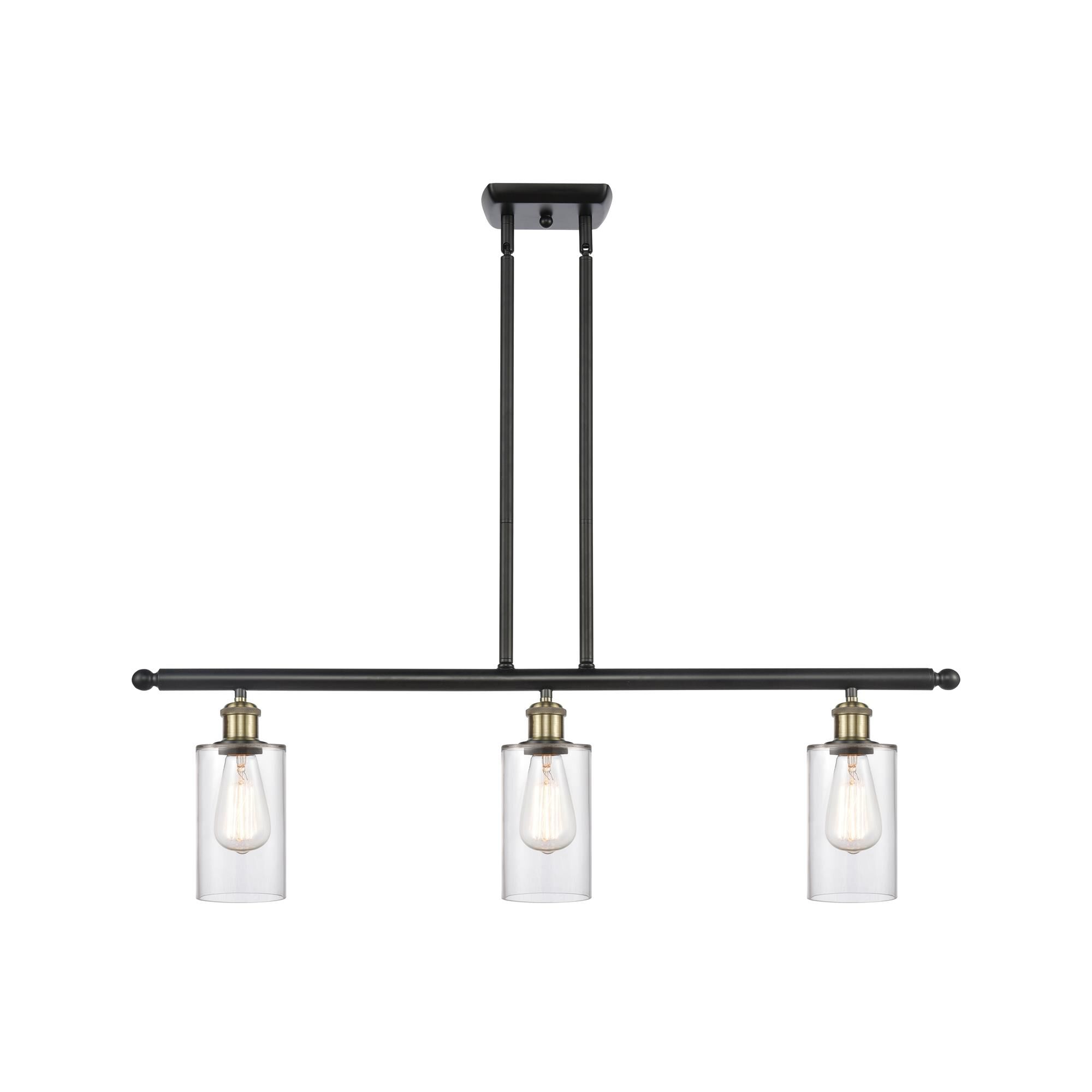 Shown in Black Antique Brass finish and Drum glass and Glass shade