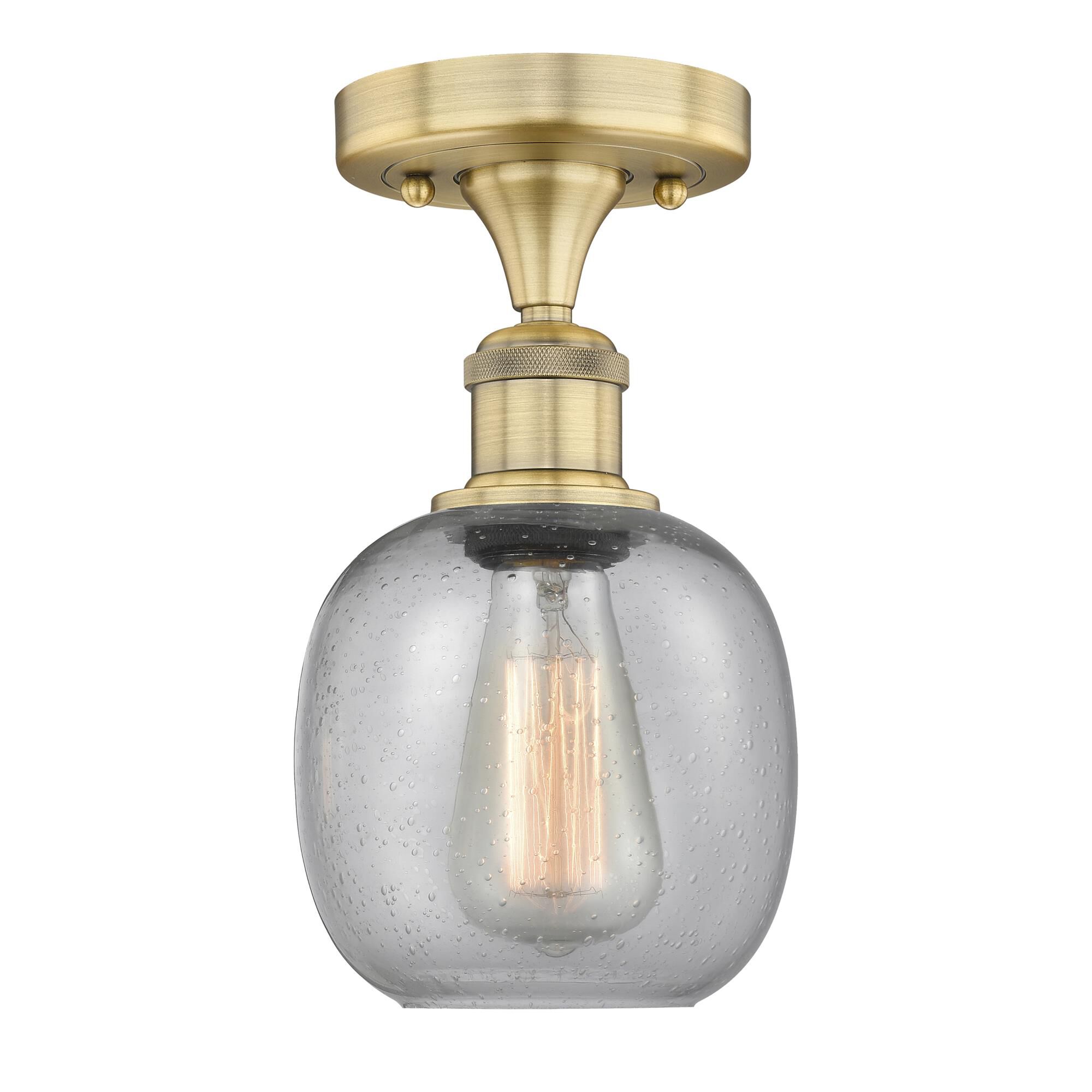 Shown in Brushed Brass finish and Seedy glass