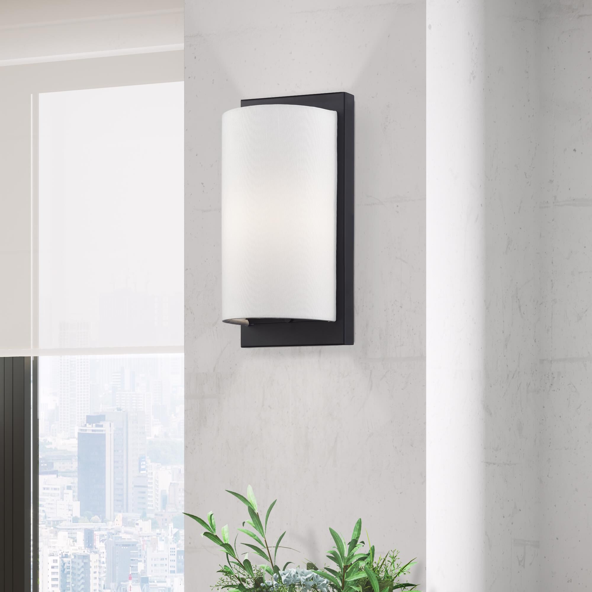 Shown in Black finish and Hand Crafted Off-White Fabric Hardback shade