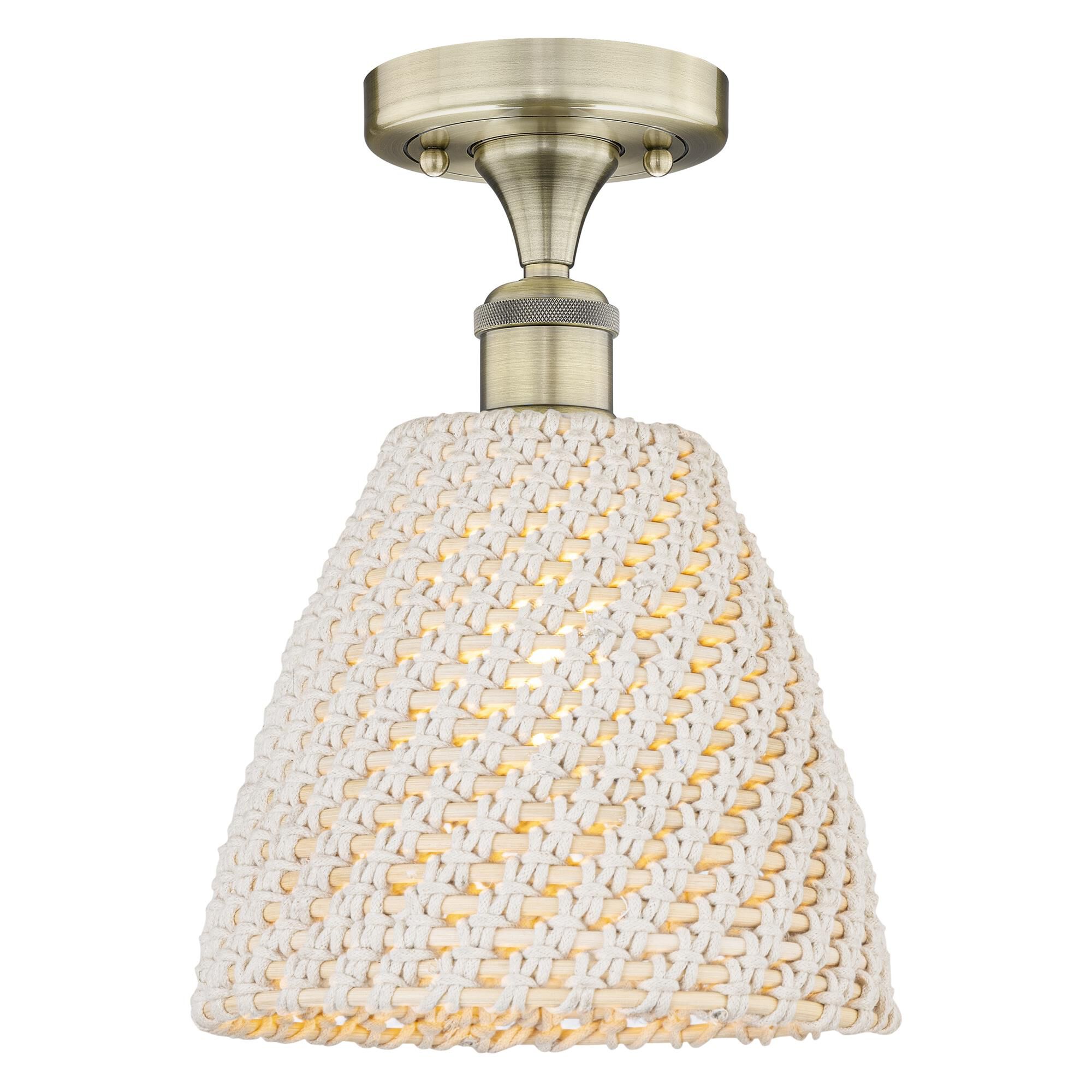 Shown in Antique Brass finish and Natural shade