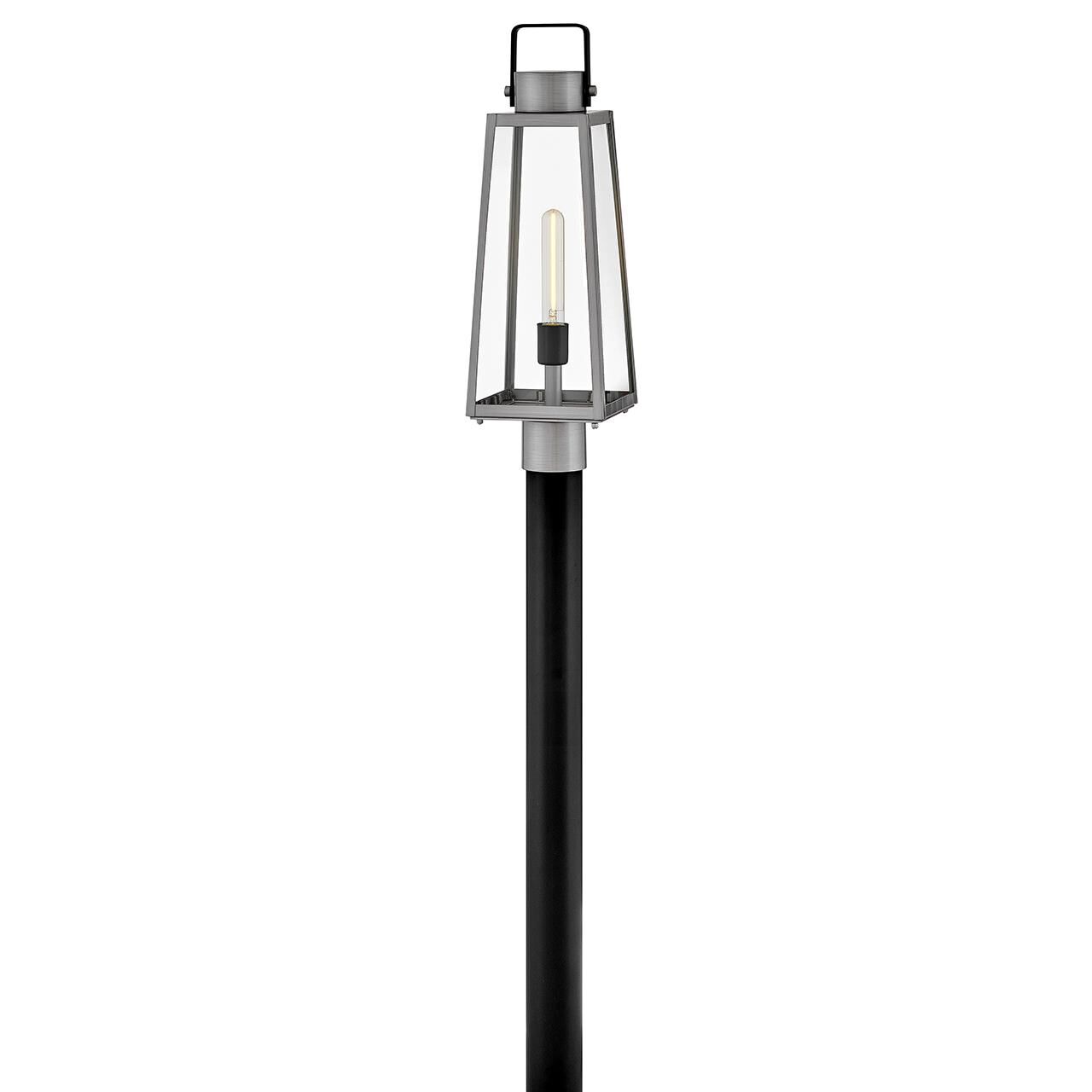 Shown in Antique Brushed Aluminum finish and Clear glass and Black accent