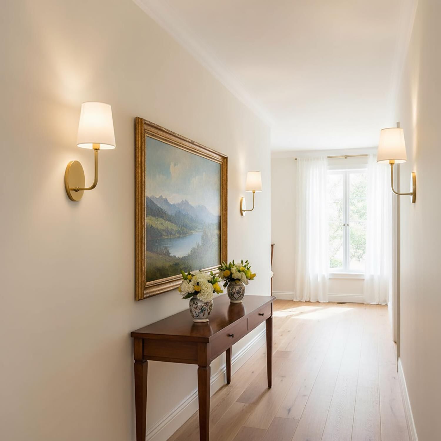 Shown in Brushed Gold finish and White Linen shade