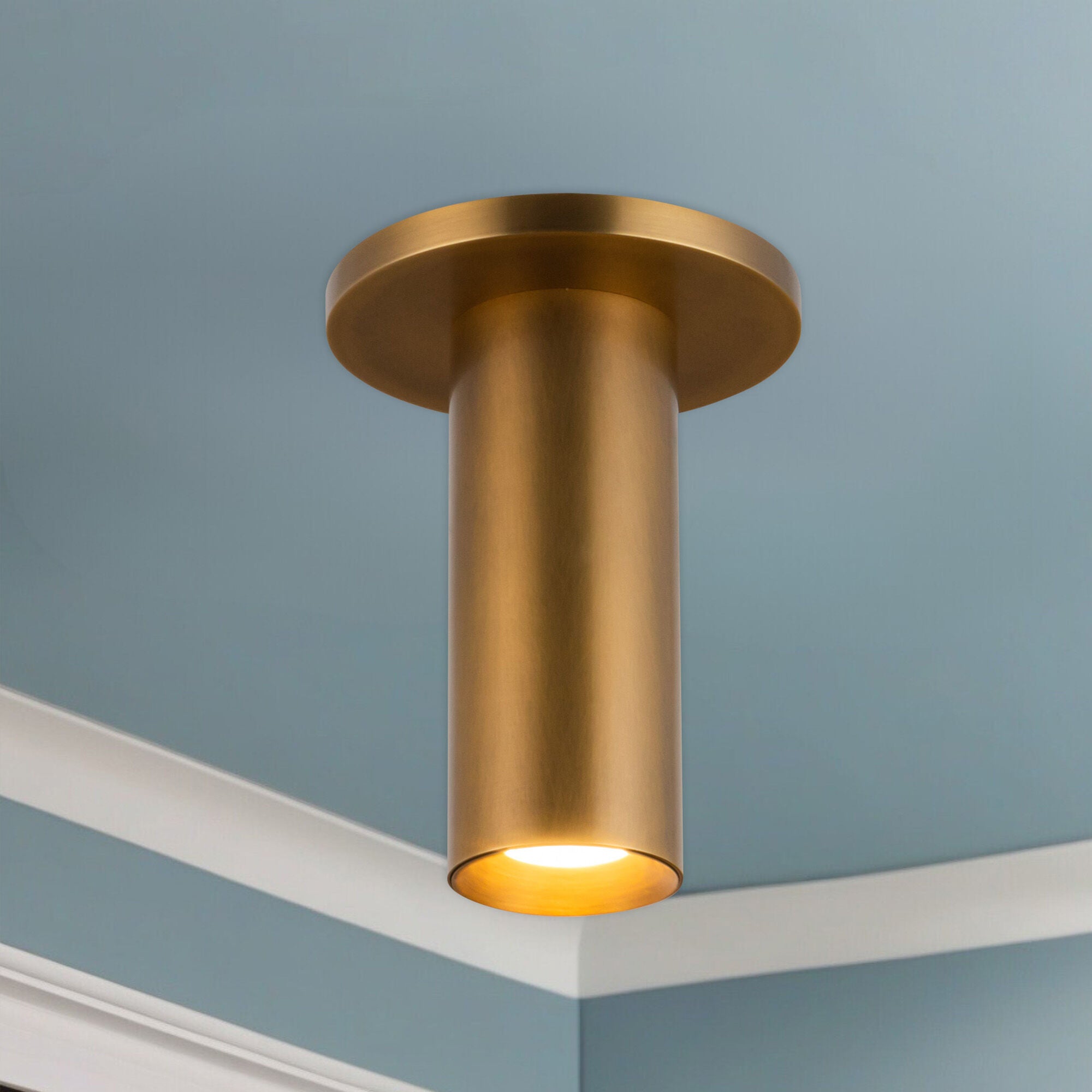 Shown in Vintage Brass finish and Aluminum Baffle shade