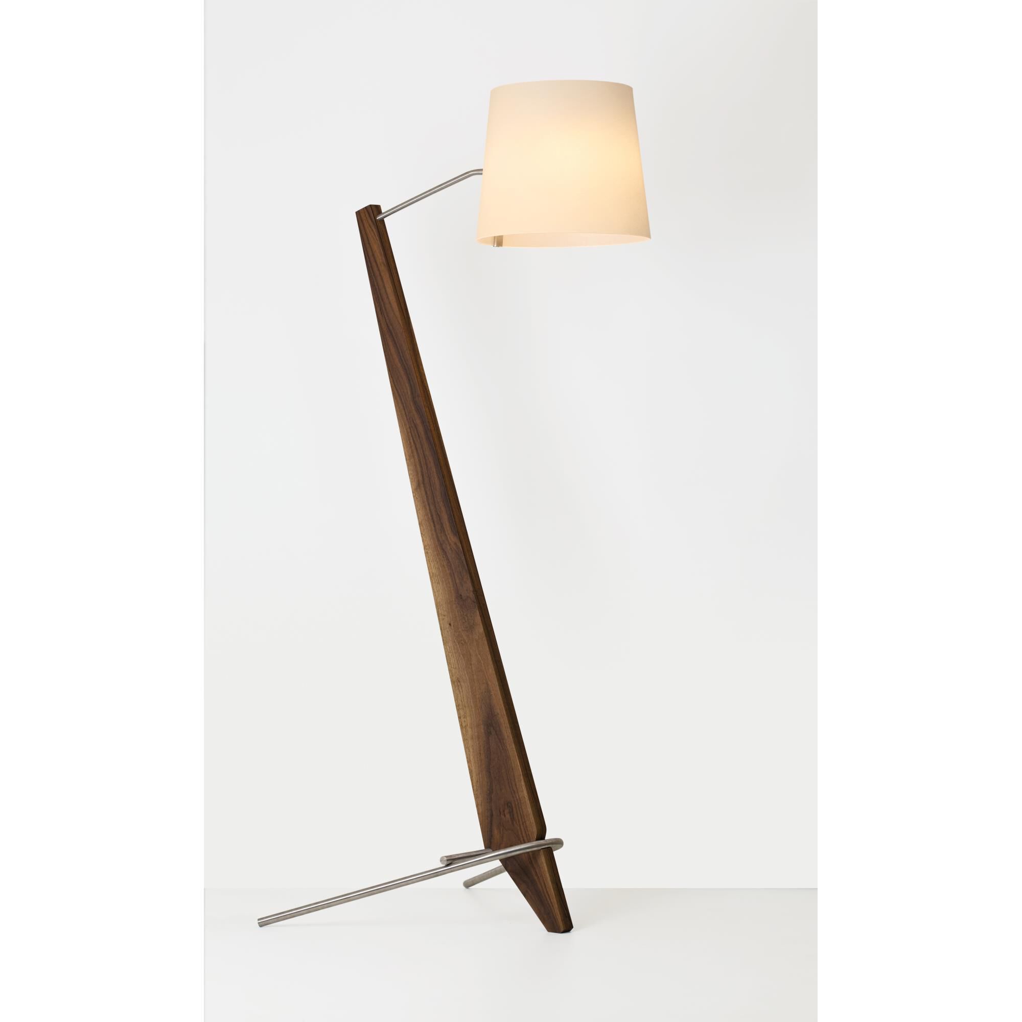 Shown in Brushed Aluminum and Oiled Walnut finish and White Linen shade