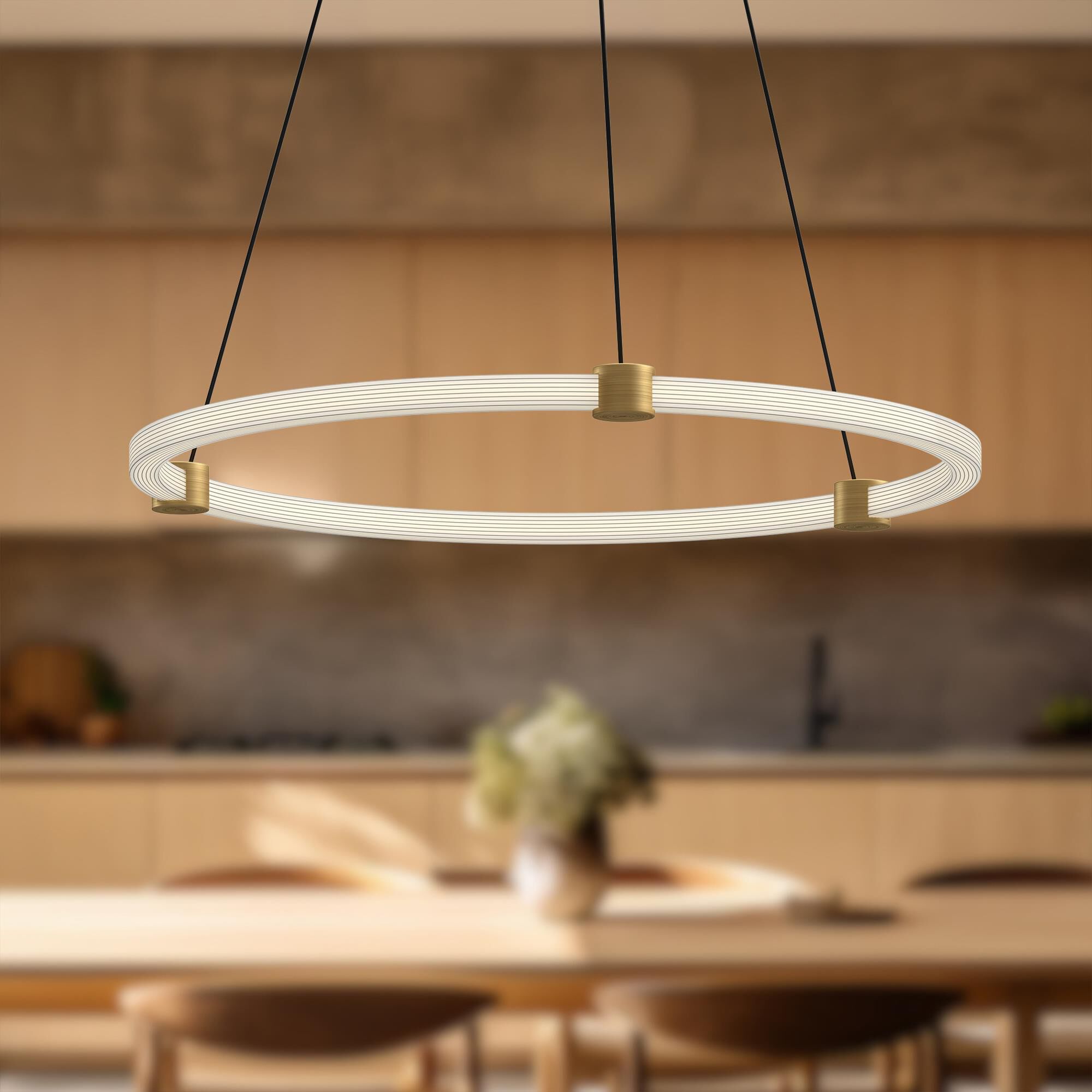 Shown in Brushed Gold finish and Clear Acrylic Exterior and White Silicone Interior glass