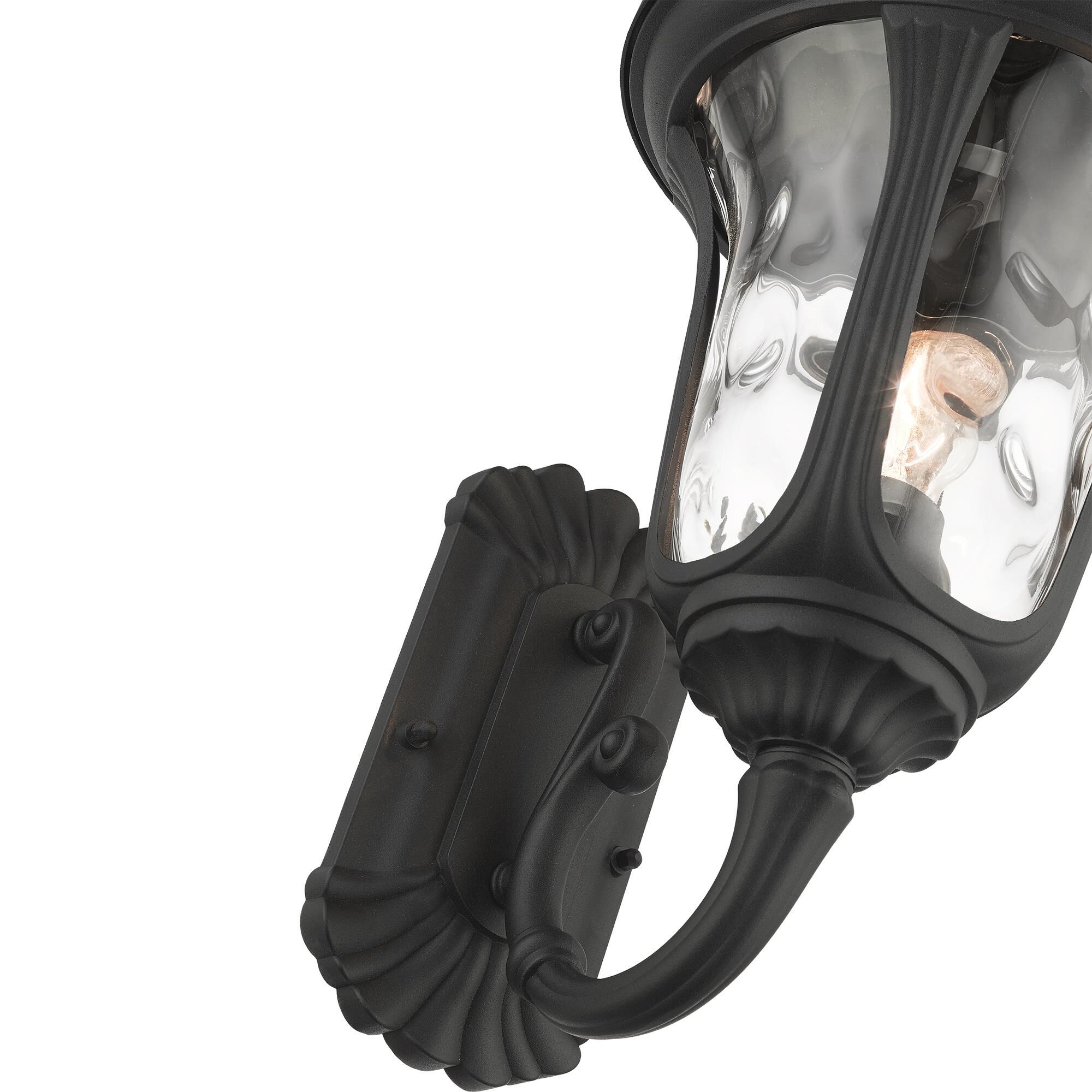 Shown in Textured Black finish and Hand Blown Clear Water glass and Hand Blown Clear Water Glass shade