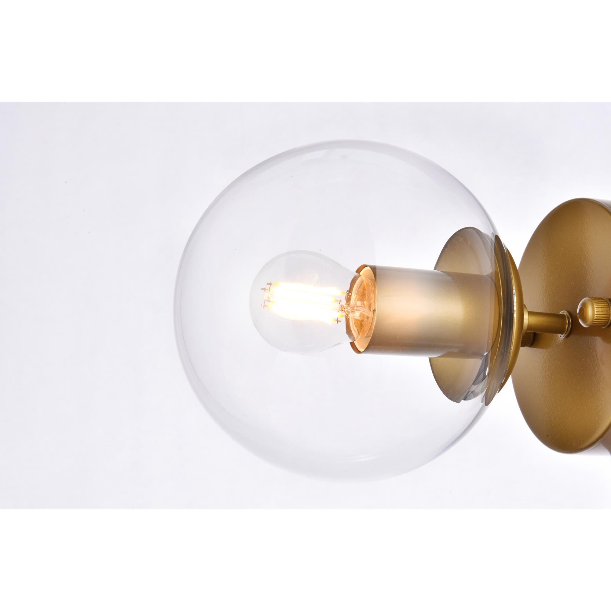 Shown in Brass finish and Clear glass