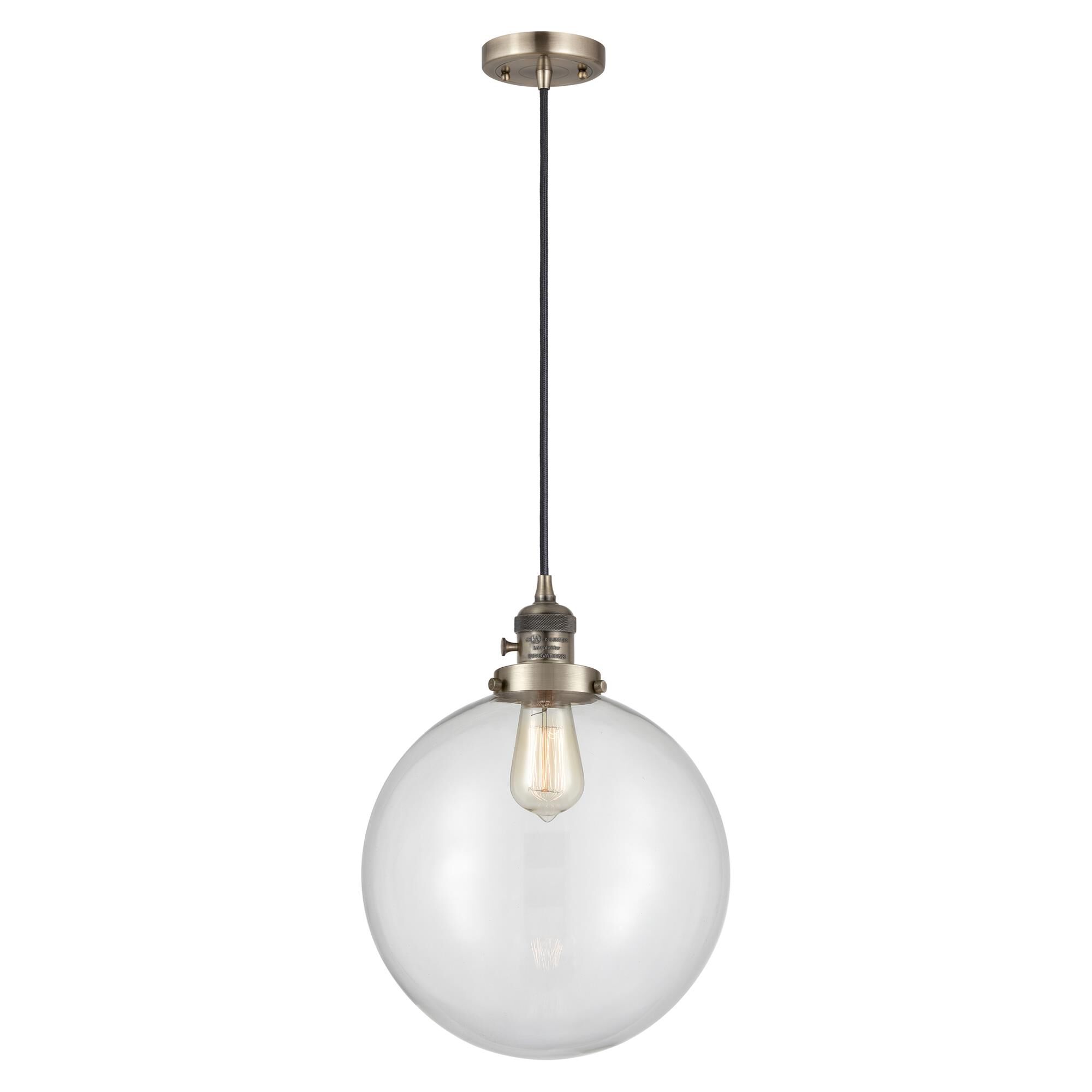 Shown in Antique Brass finish and Clear glass