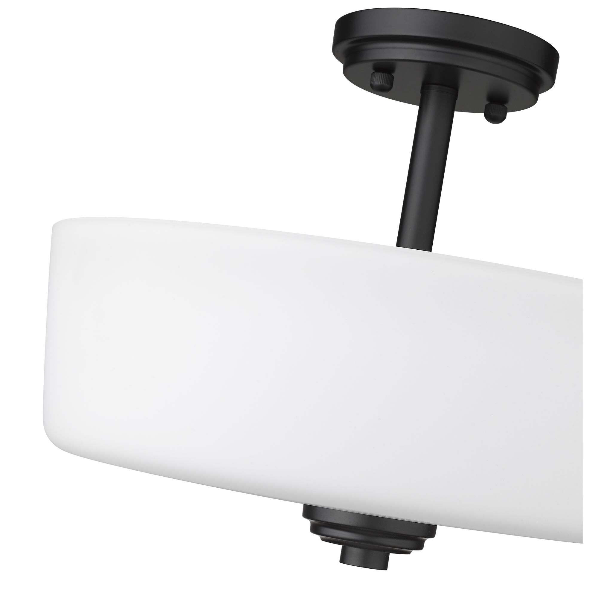 Shown in Matte Black finish and Glass shade