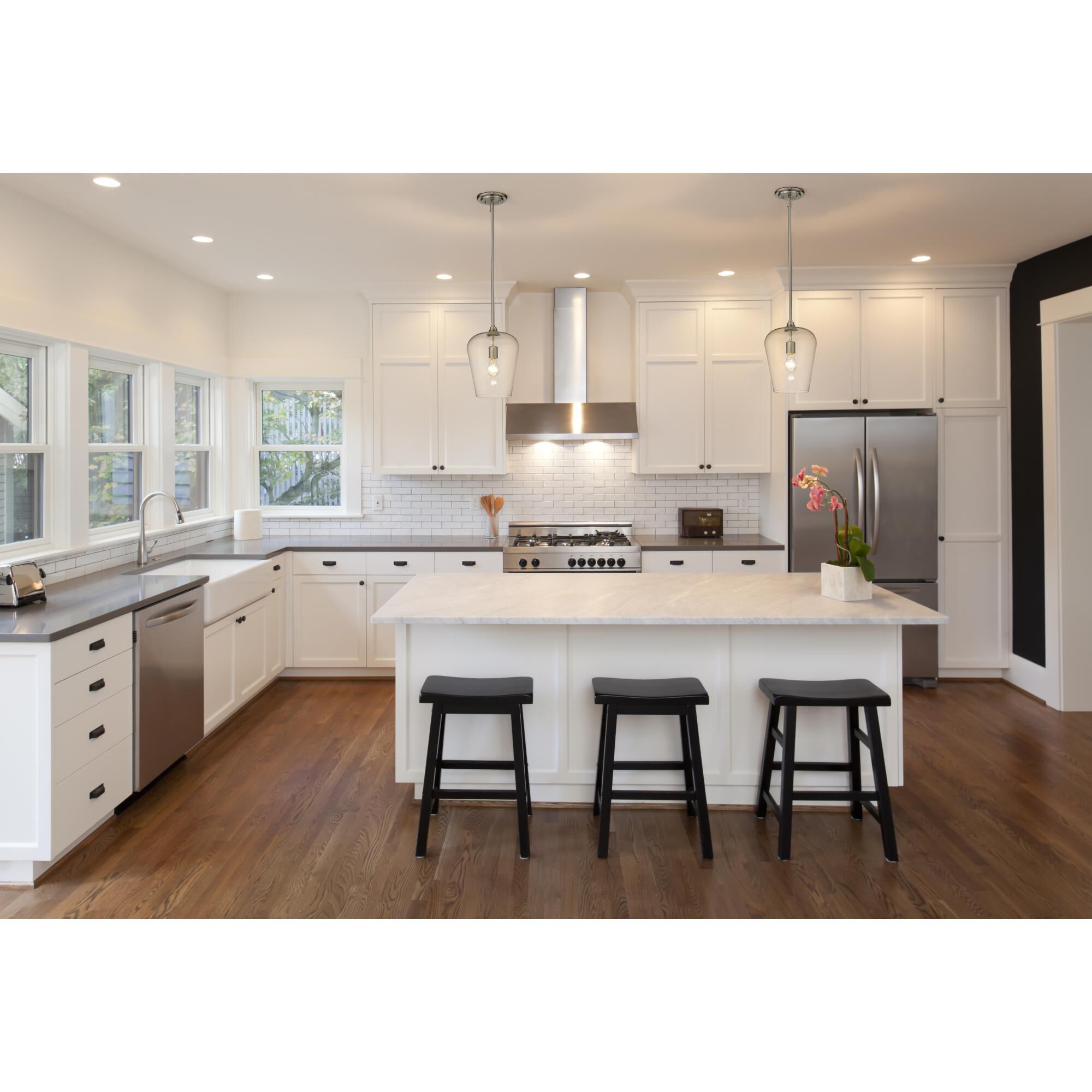 Shown in Brushed Nickel finish and Glass shade