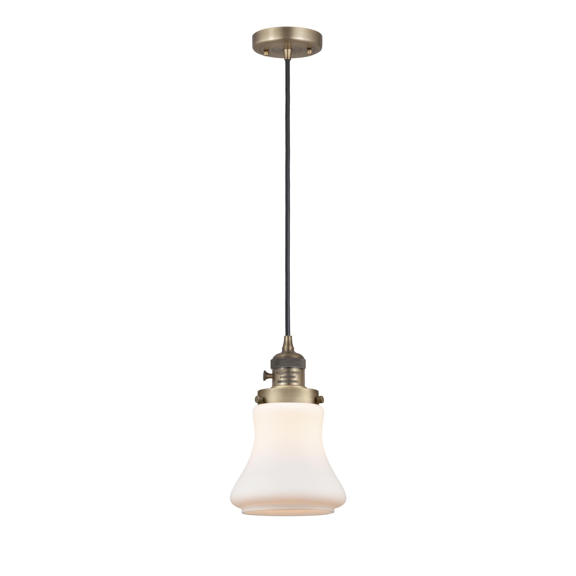 Shown in Brushed Brass finish and Matte White glass