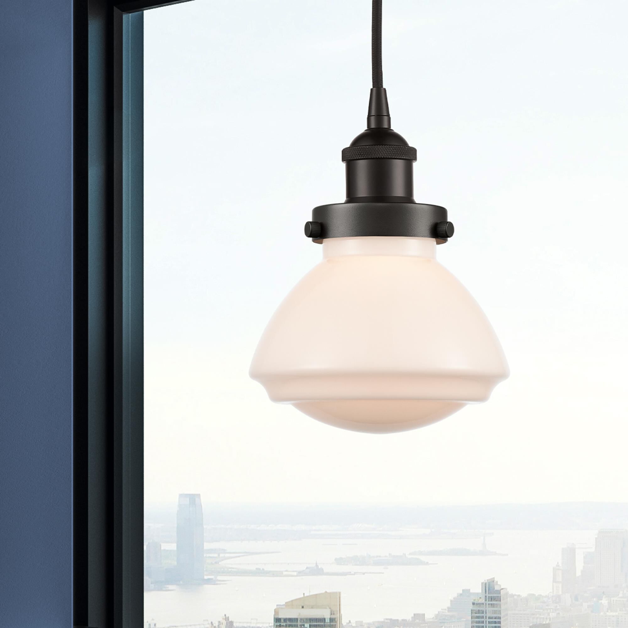 Shown in Oil Rubbed Bronze finish and Matte White glass