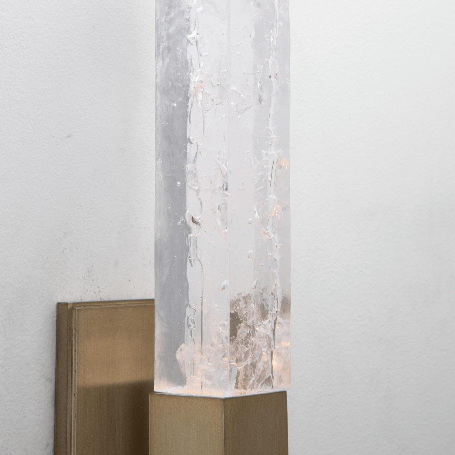 Shown in Novel Brass finish and Clear Cast glass