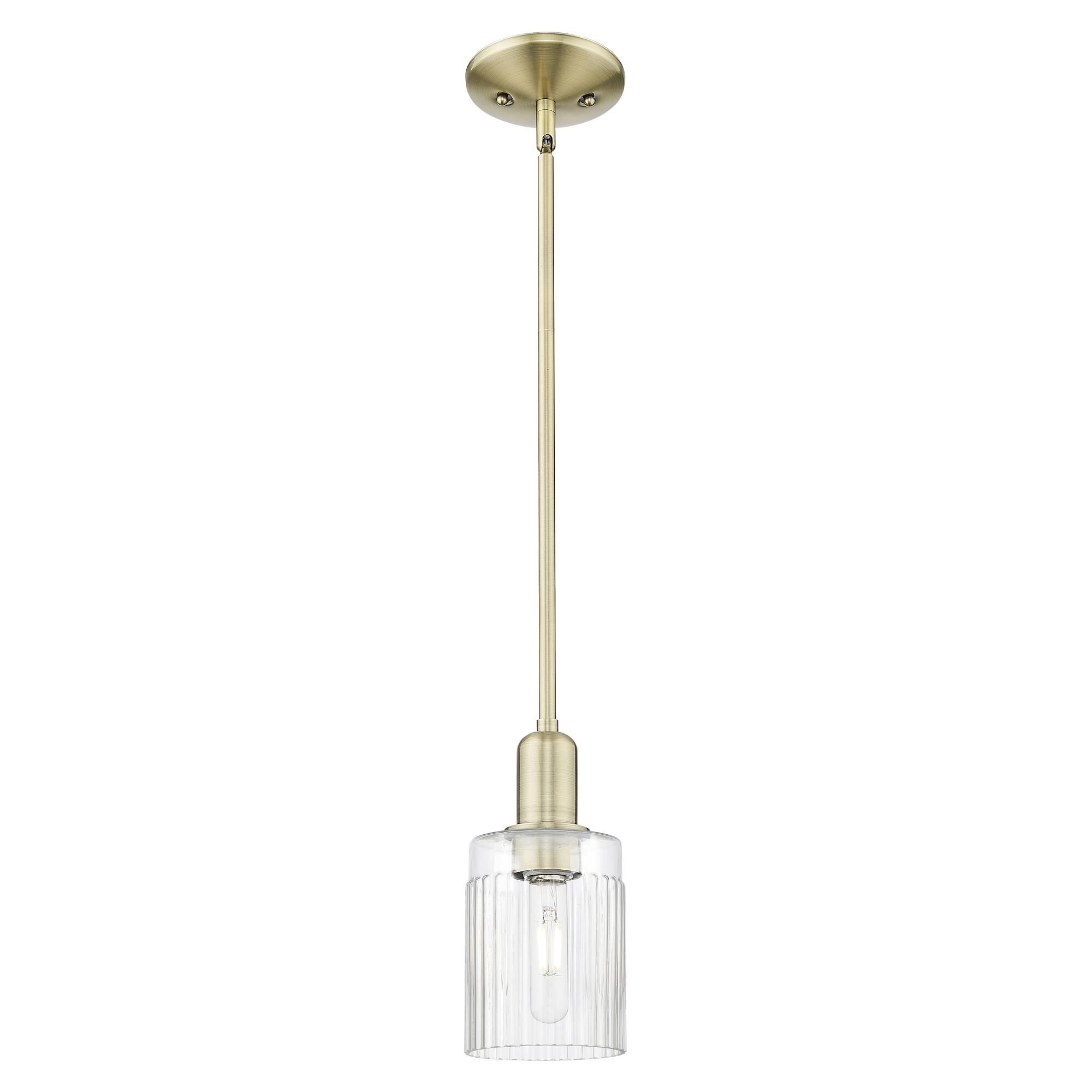 Shown in Antique Brass finish and Clear glass