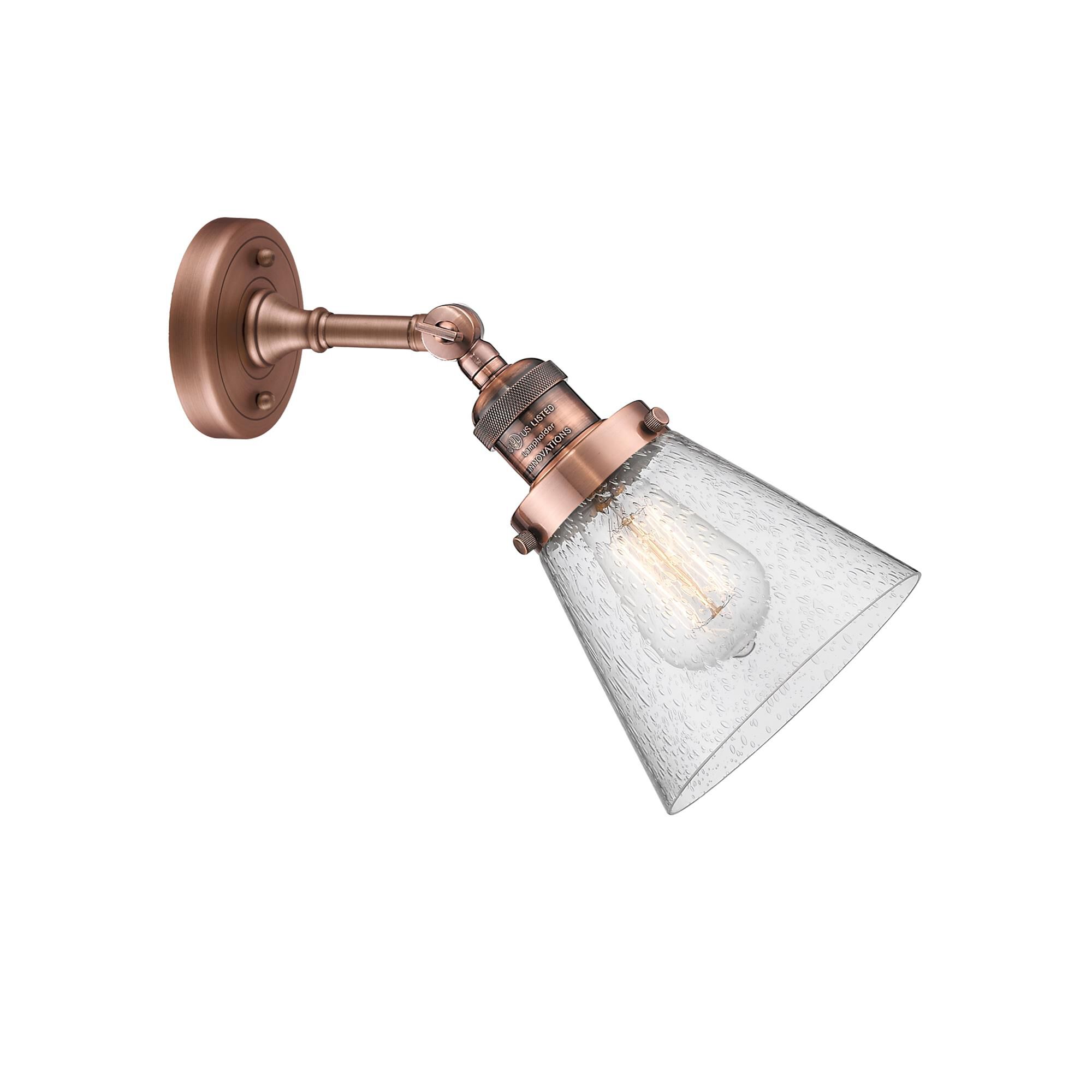 Shown in Antique Copper finish and Seedy glass and None accent