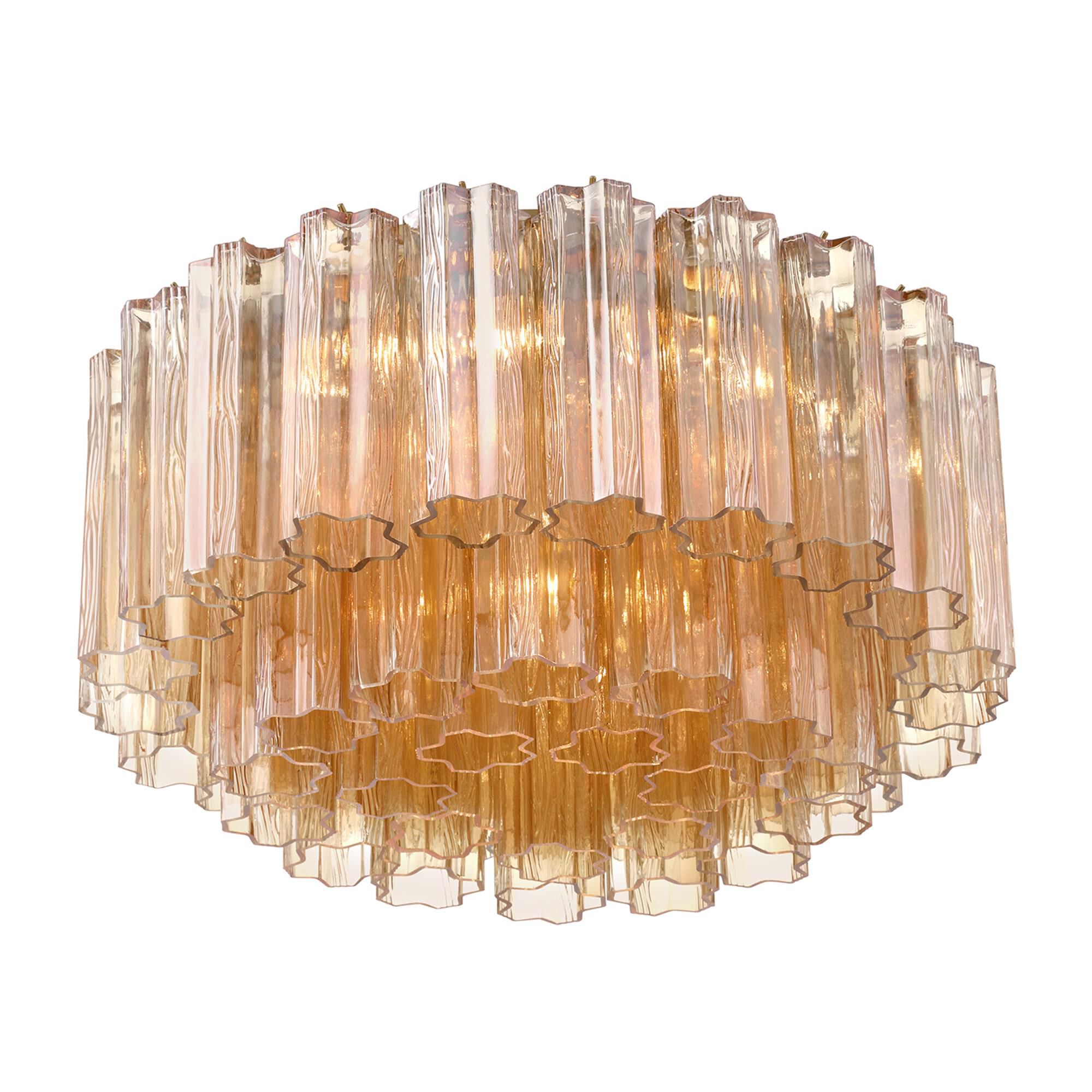 Shown in Aged Brass finish and Tronchi Amber glass