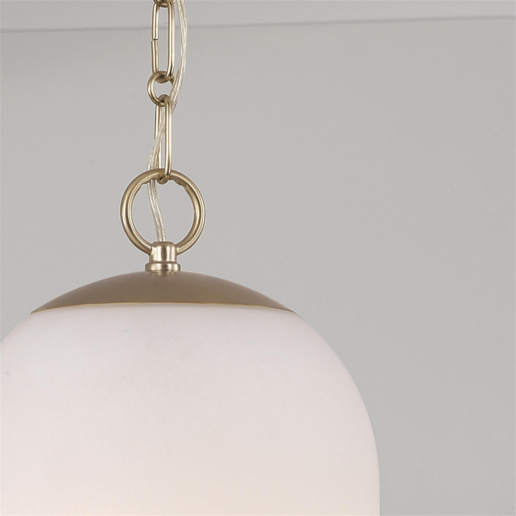 Shown in Matte Brass finish and Soft White glass