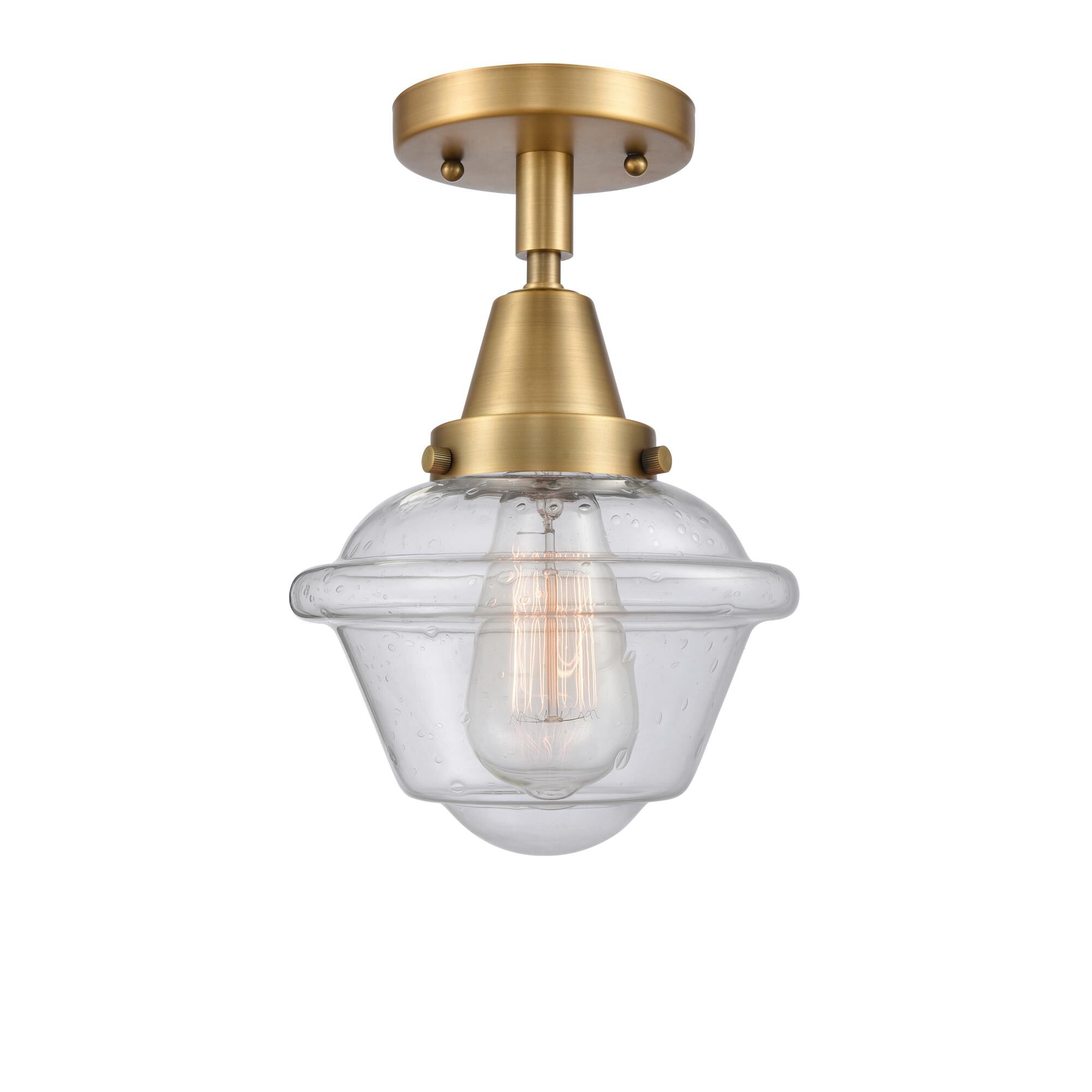 Shown in Brushed Brass finish and Seedy Small Oxford glass