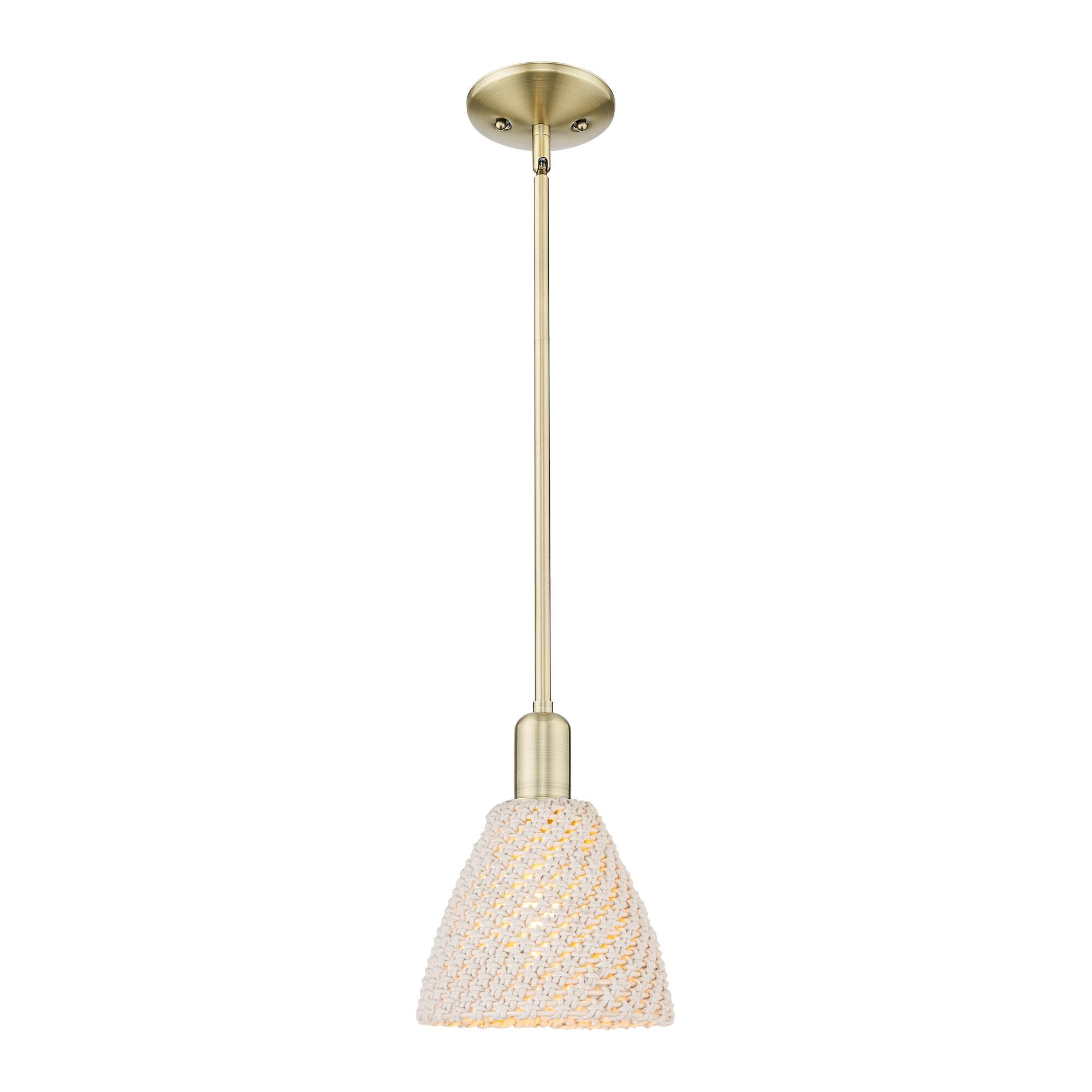 Shown in Antique Brass finish and Natural shade