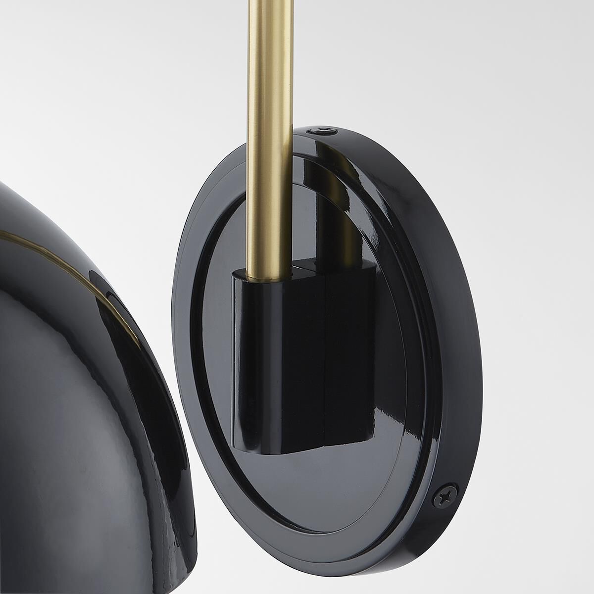 Shown in Aged Brass and Glossy Black finish and Metal shade