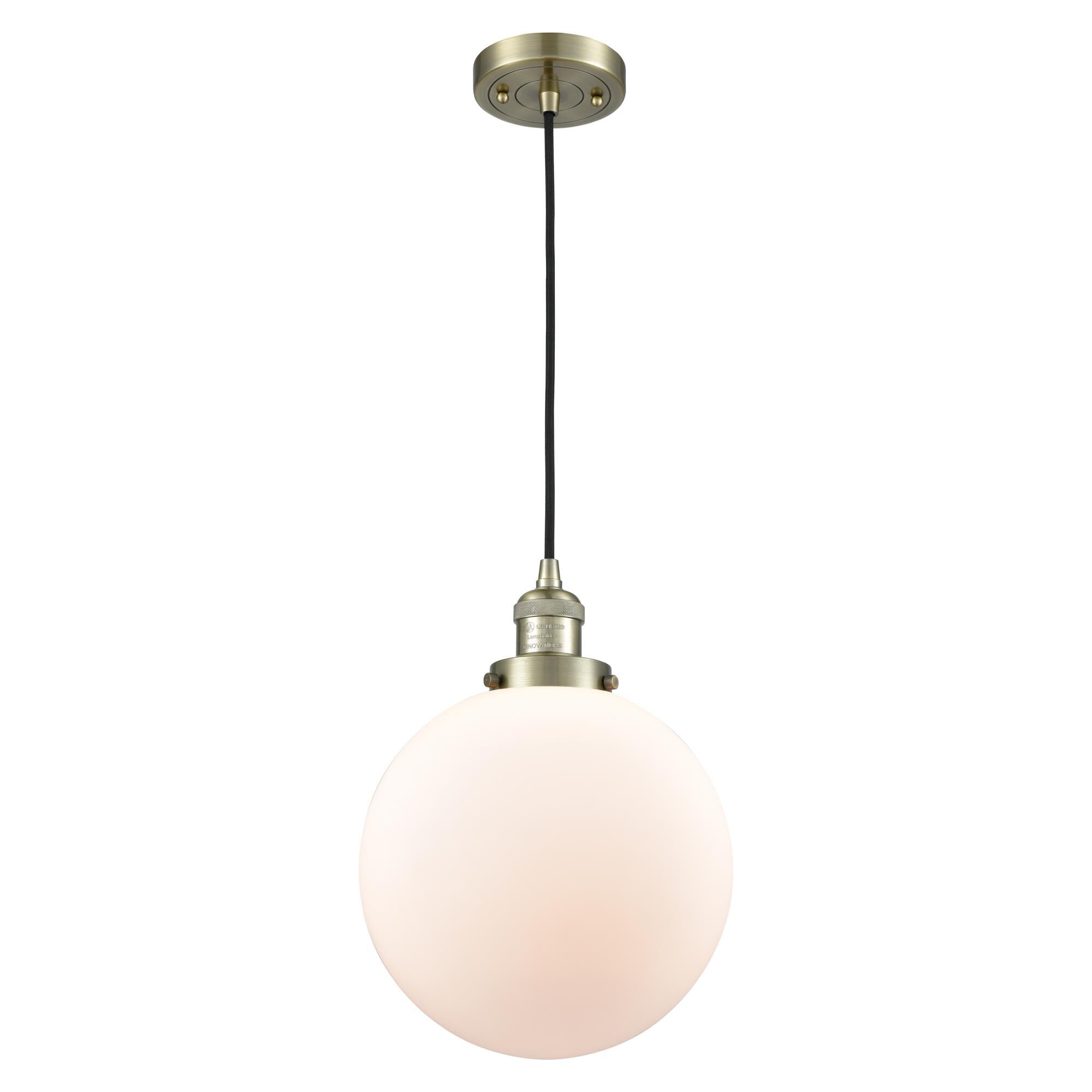 Shown in Antique Brass finish and Matte White Cased glass