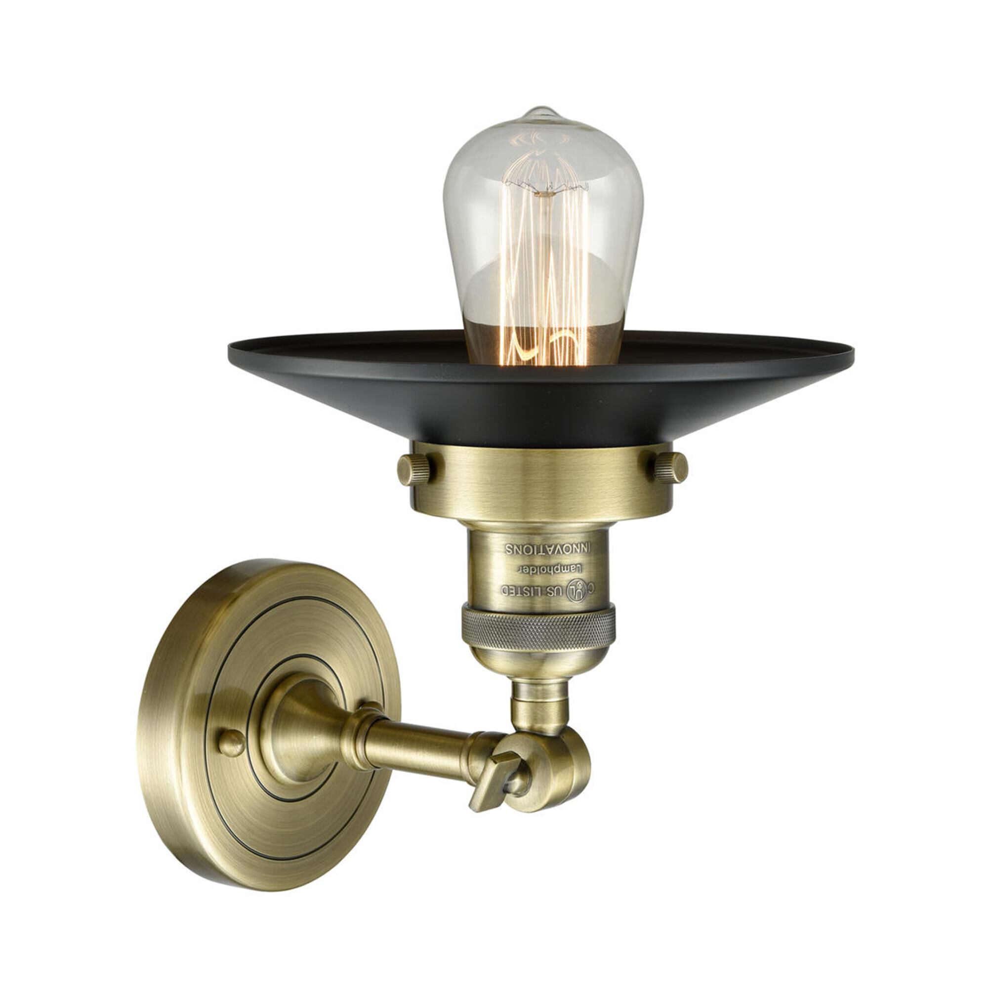 Shown in Antique Brass finish and Antique Brass glass and Matte Black shade and No Accent accent