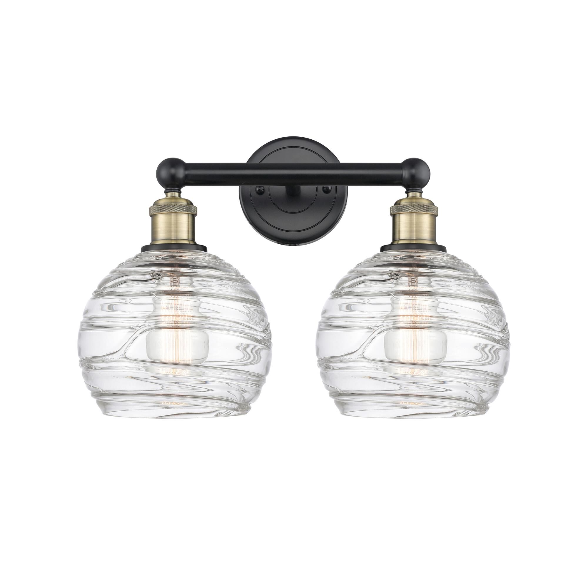 Shown in Black Antique Brass finish and Clear Deco Swirl glass