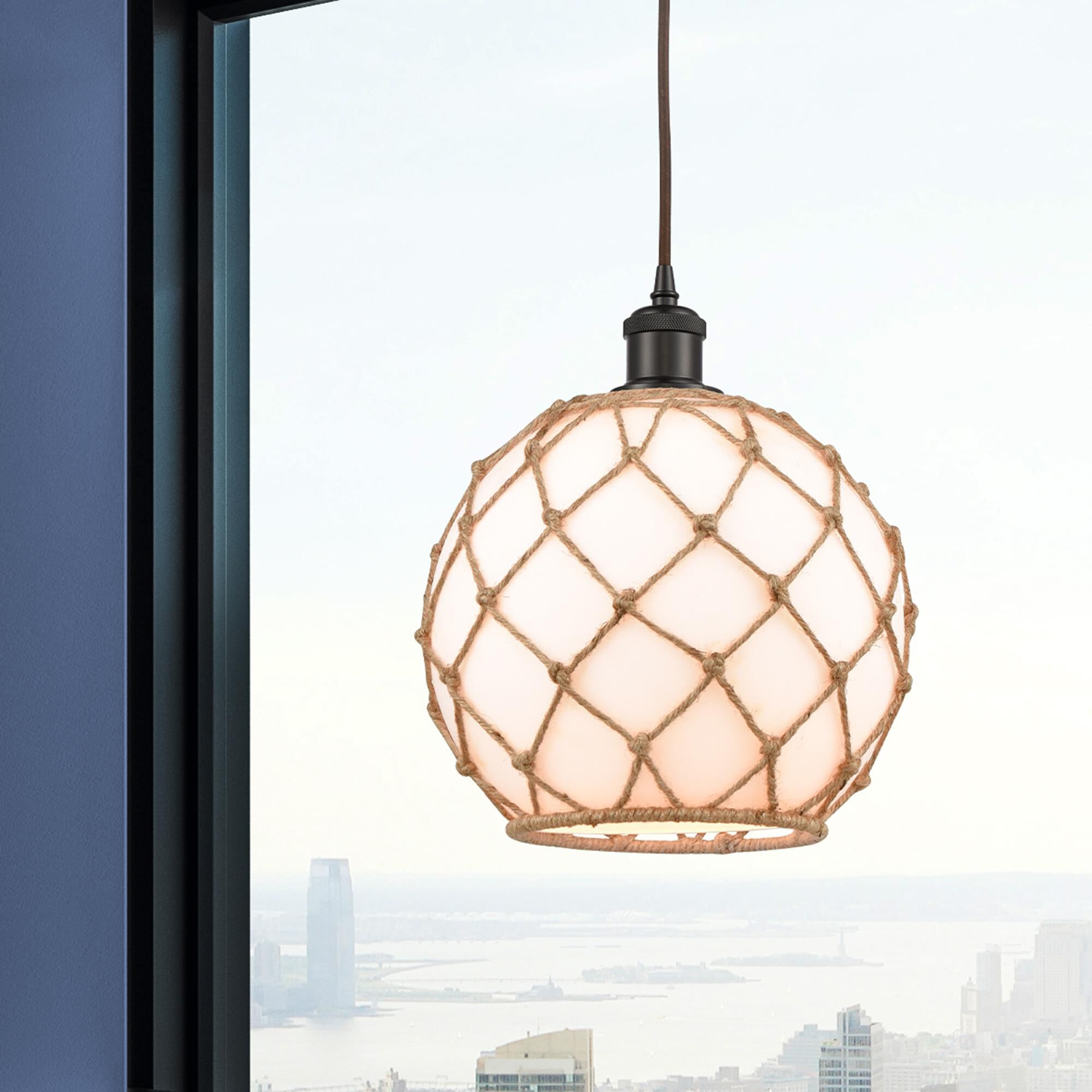 Shown in Oil Rubbed Bronze finish and White With Black Rope glass